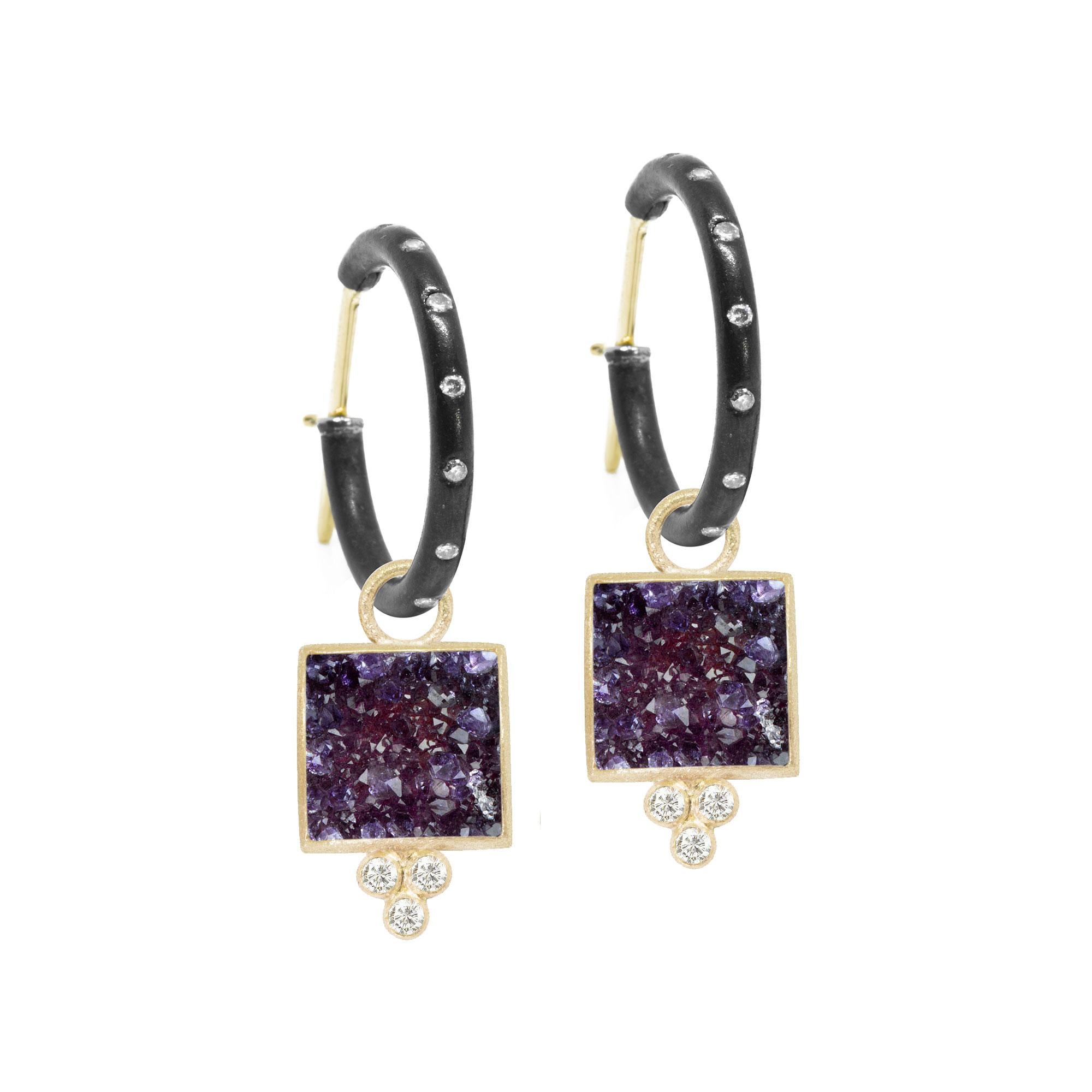 Square dance: Designed with hand-faceted amethyst druzy framed in a textured gold, our diamond-accented Ariana Gold Charms pair with any of our hoops and mix well with other styles.
Nina Nguyen Design's patent-pending earrings have an element on the