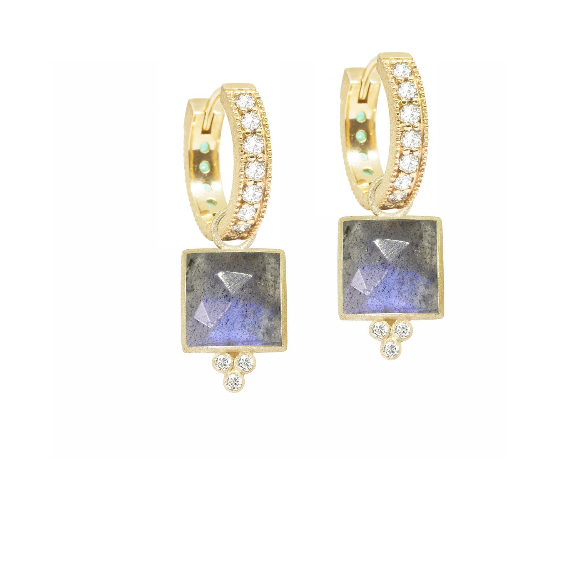 Square dance: Designed with hand-faceted labradorite framed in a textured gold bezel, our Ariana Gold Ring is your new signature style, with diamond side stones for some extra sparkle.

Nina Nguyen Design's patent-pending earrings have an element on