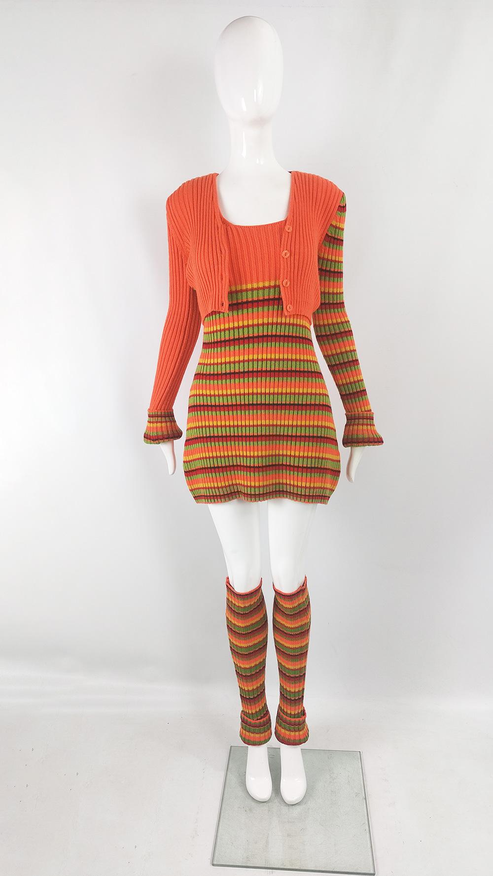 A fabulous and rare vintage womens 3 piece dress set from the early 2000s by luxury French label, Aridza Bross, best known for championing a 70s revival aesthetic in the late 90s and early 2000s. In an orange, green and yellow striped knit fabric -