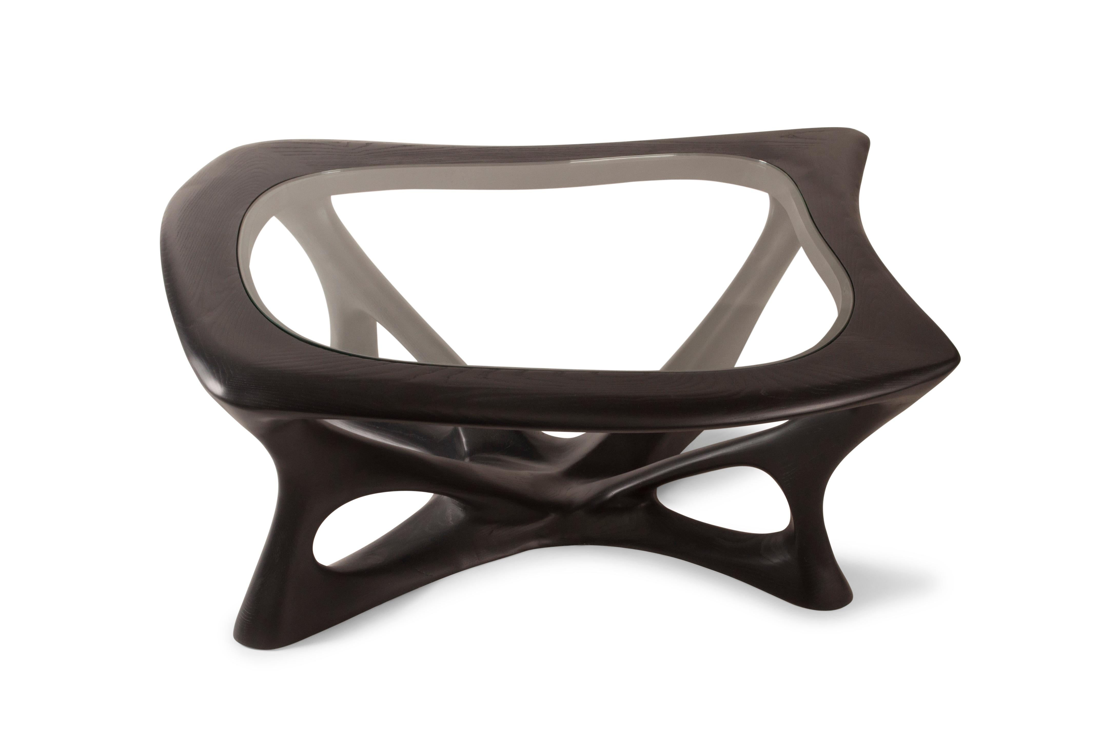 Ariella coffee table is made from solid ashwood. 

About Amorph: 
Amorph is a design and manufacturing company based in Los Angeles, California. We take pride in hand crafted designs connected to technology to create sophisticated, design driven