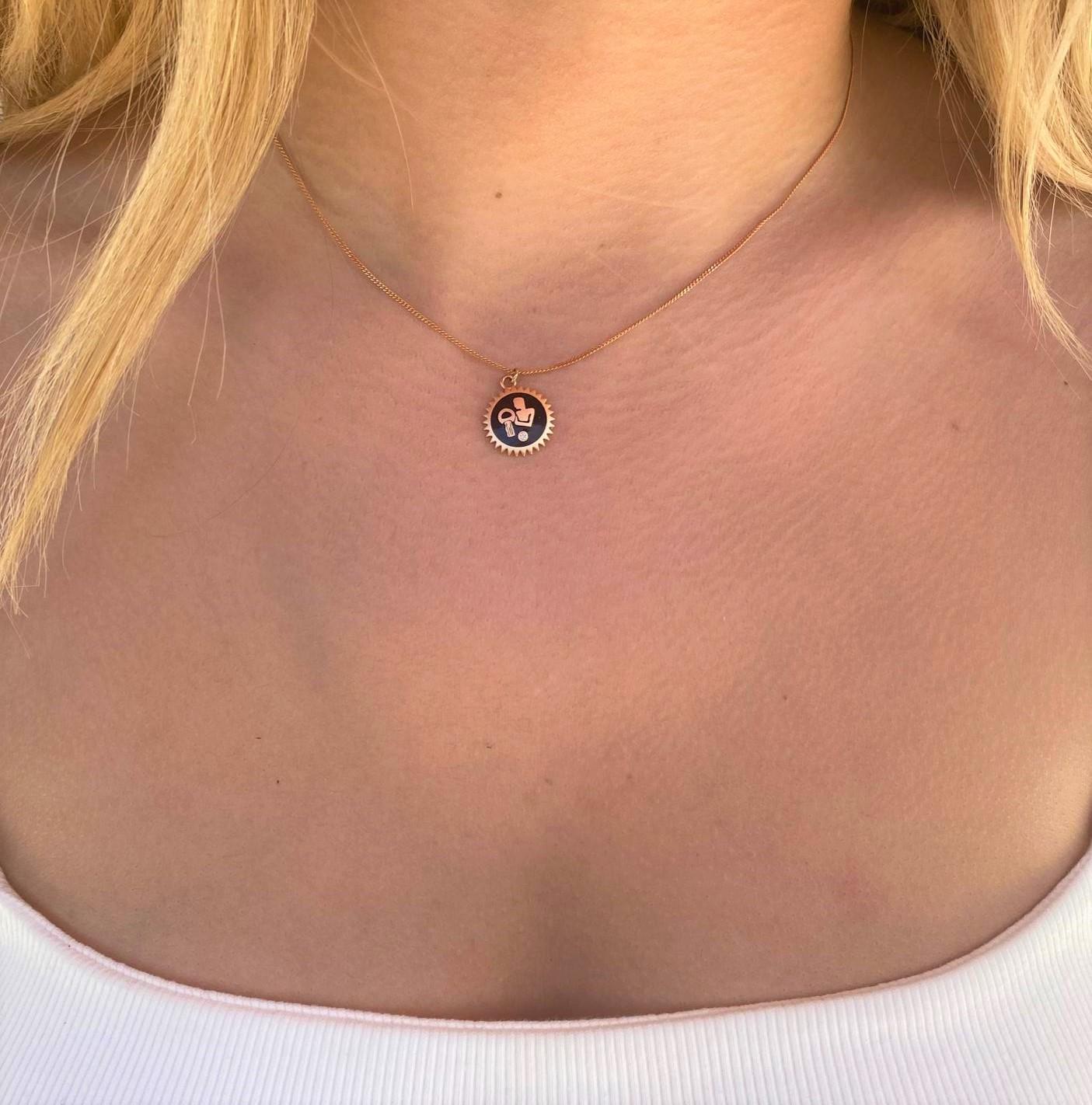 Aries necklace with black enamel & white diamond in 14k rose gold by selda jewellery

Additional Information:-
Collection: Zodiac collection
14K Rose gold
0.01ct White diamond
Pendant height 1cm
Chain length 40cm