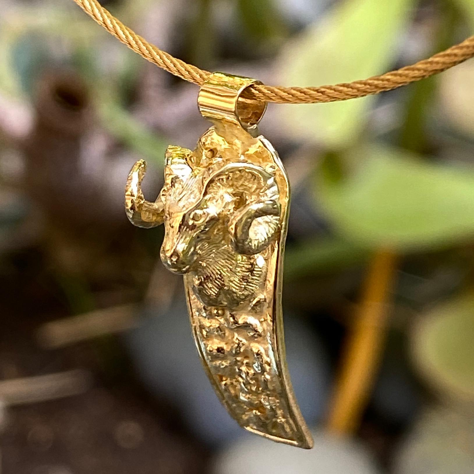 gold ram pendant