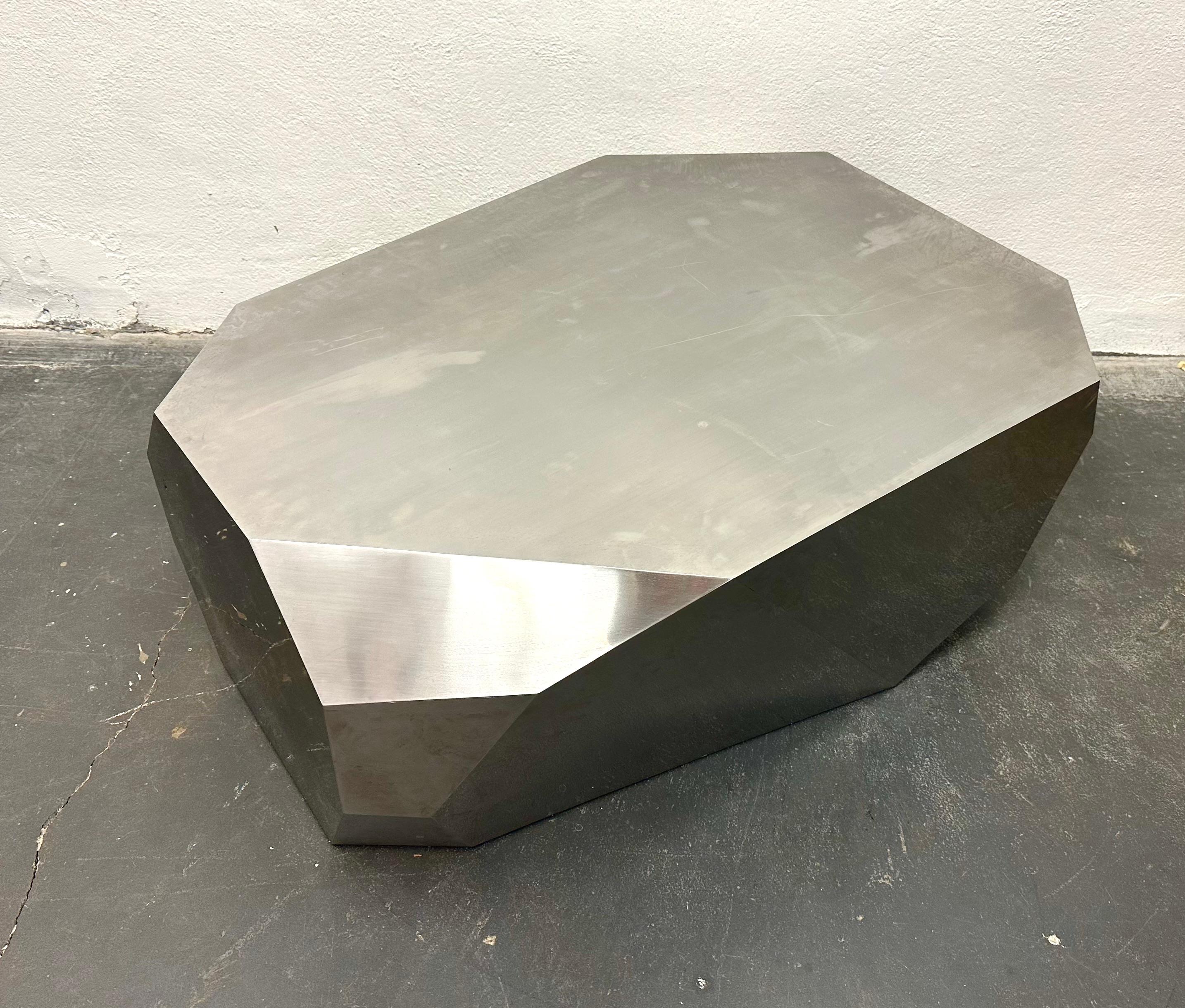 Earthy yet futuristic brushed steel-clad coffee or occasional table or bench. Very well constructed with invisible seams.
