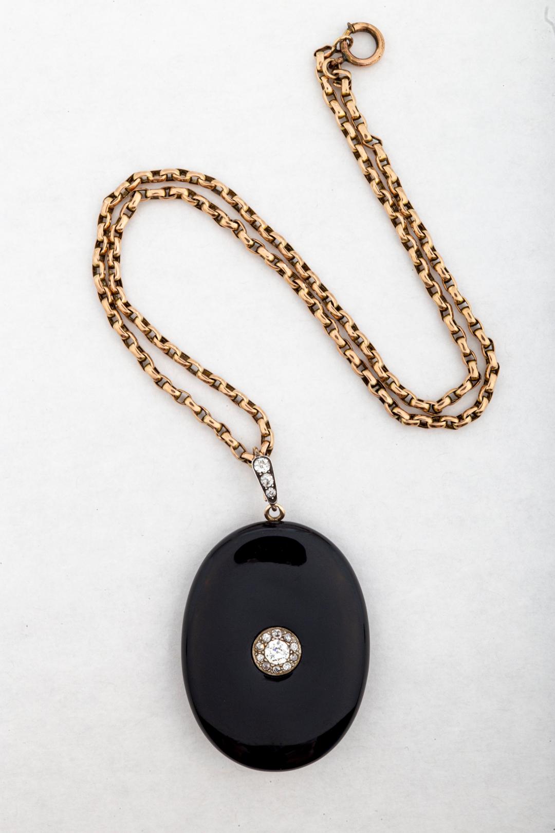 A large Victorian black enamel and diamond locket locket that is the upmost of elegance while it suits all the fashion we wear today. If I were not in business I would treasure it and wear it with a Tuxedo jacket and blue jeans or a denim shirt. The
