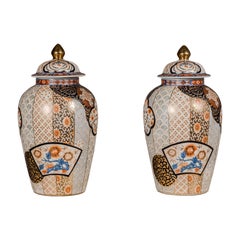 Arita Japanese Style Lidded Jars with Gold, Blue and Orange Floral Motifs