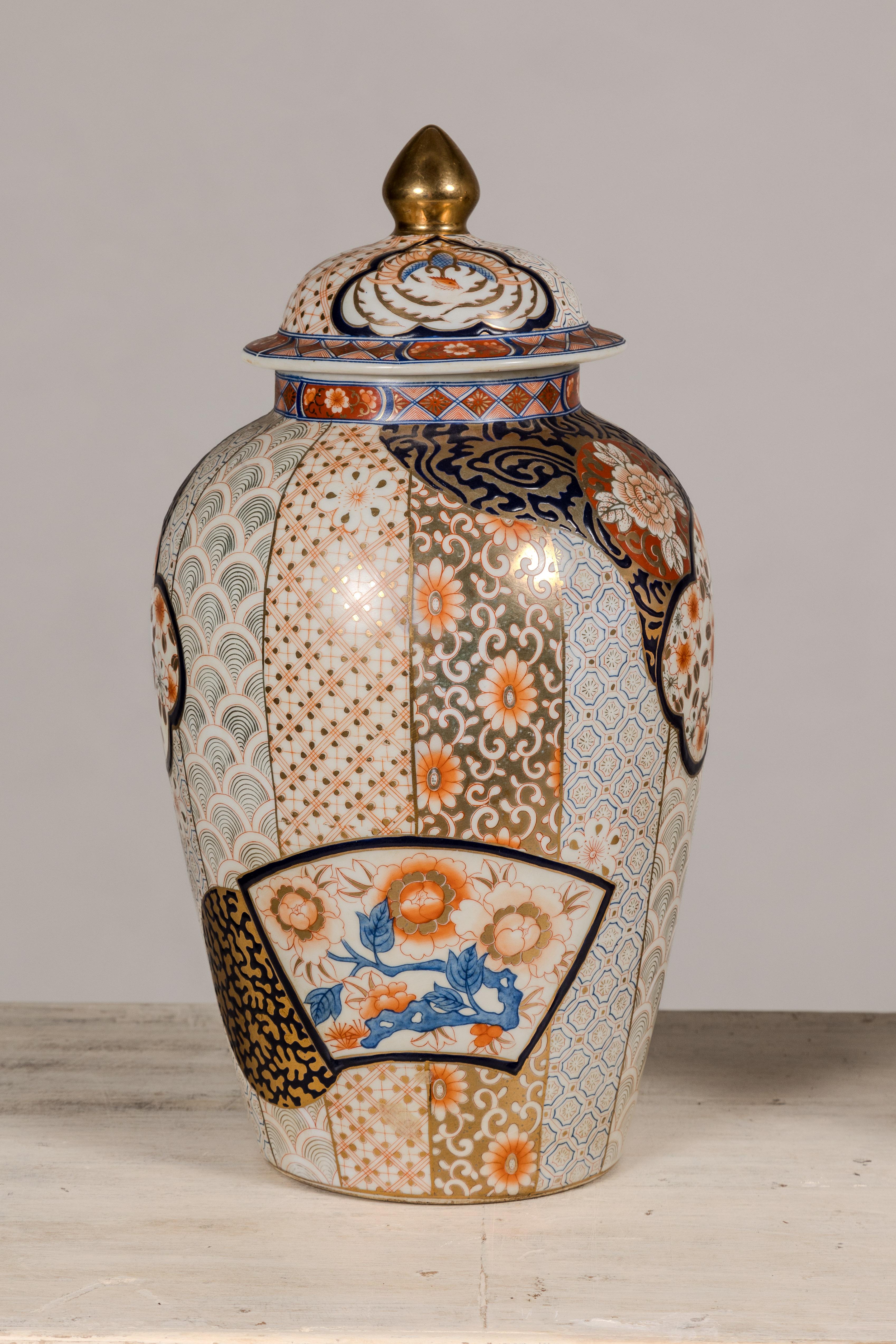 Chinese Arita Japanese Style Lidded Jars with Gold, Blue and Orange Floral Motifs For Sale