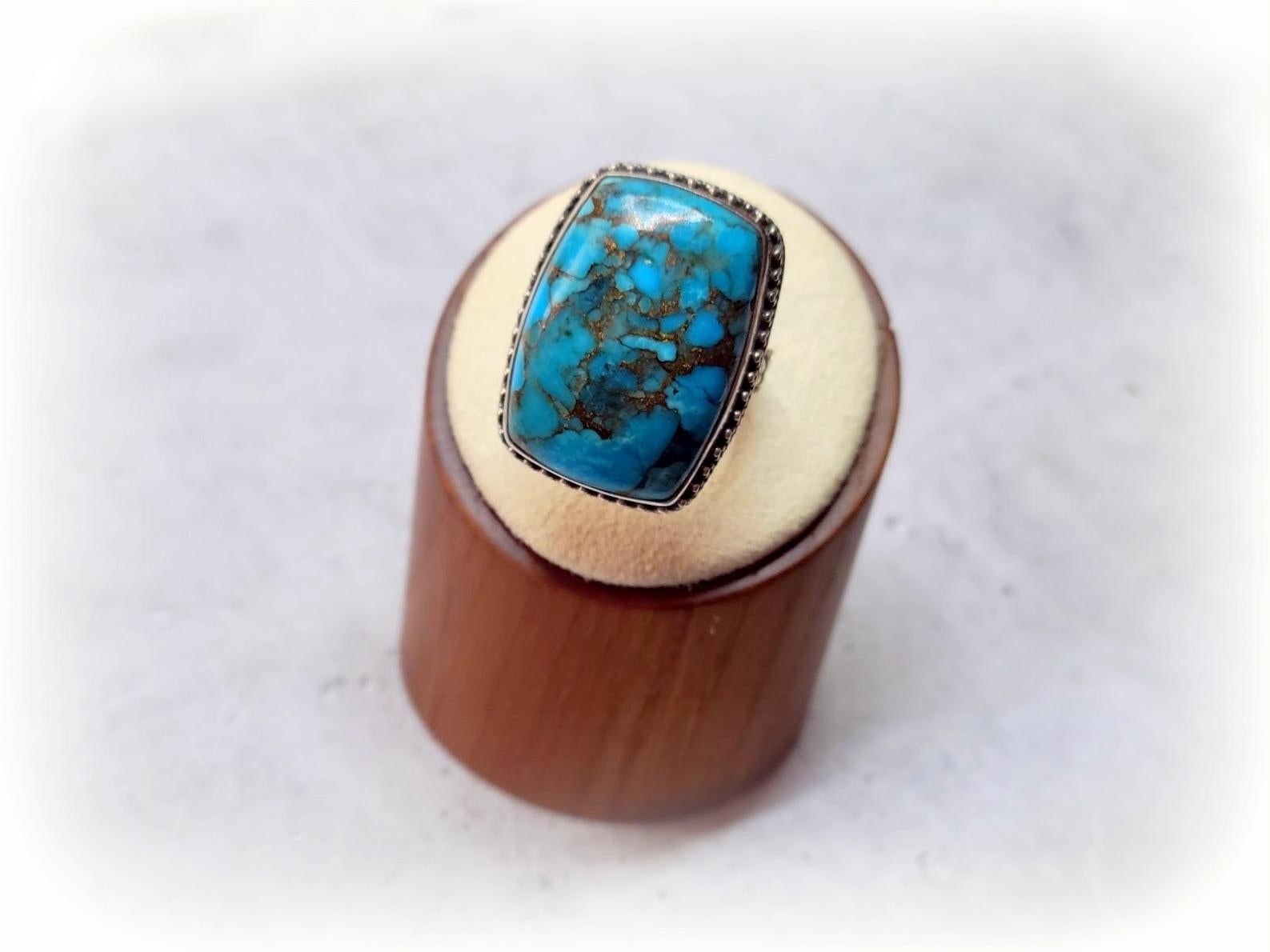 This beautiful, rare, comfortable ring is made from a high-quality Arizona Morenci turquoise cabochon in the sterling silver set.

The Morenci turquoise stone is approximately 26mm x 17.6mm
The US size of the ring is 7.
The weight of the ring is