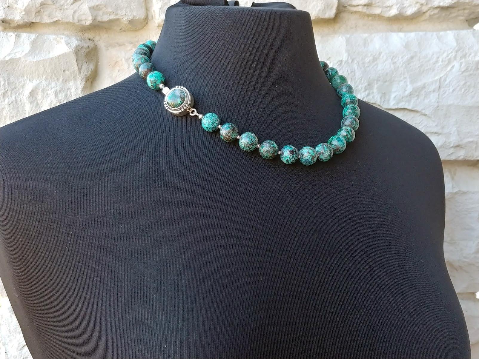 The necklace is 19.5 inches (49.5 cm) long, and the smooth round beads are 12 mm in size.
Sharp and vibrant in coloring, dark and light blue, turquoise. Such a color and gradation make it seem like a bead, but no—it's like a planet! In bright