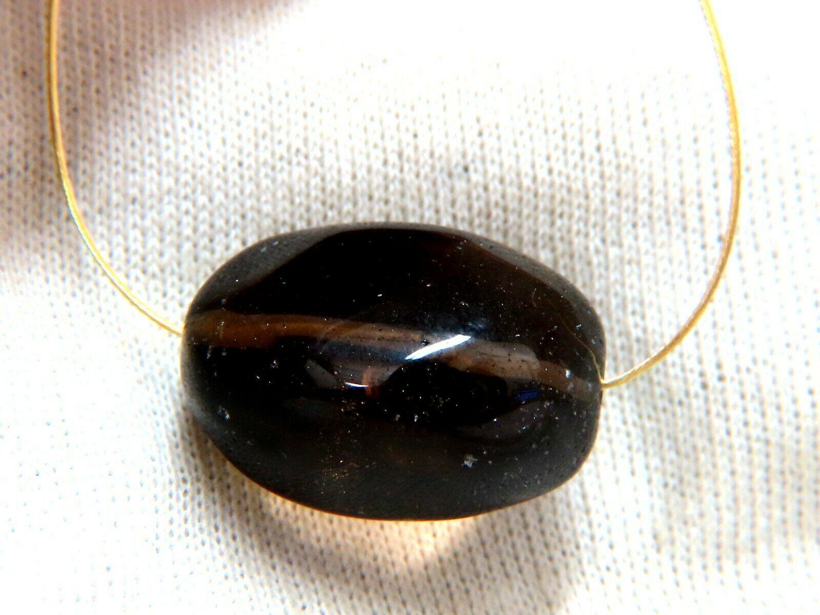 Natural Solitaire Floating Arizona Smokey Topaz Necklace
65ct Topaz

Tumble Cabochon Cut: 24 x 17mm


Clean clarity & Transparent

14kt. yellow gold
14 inches long