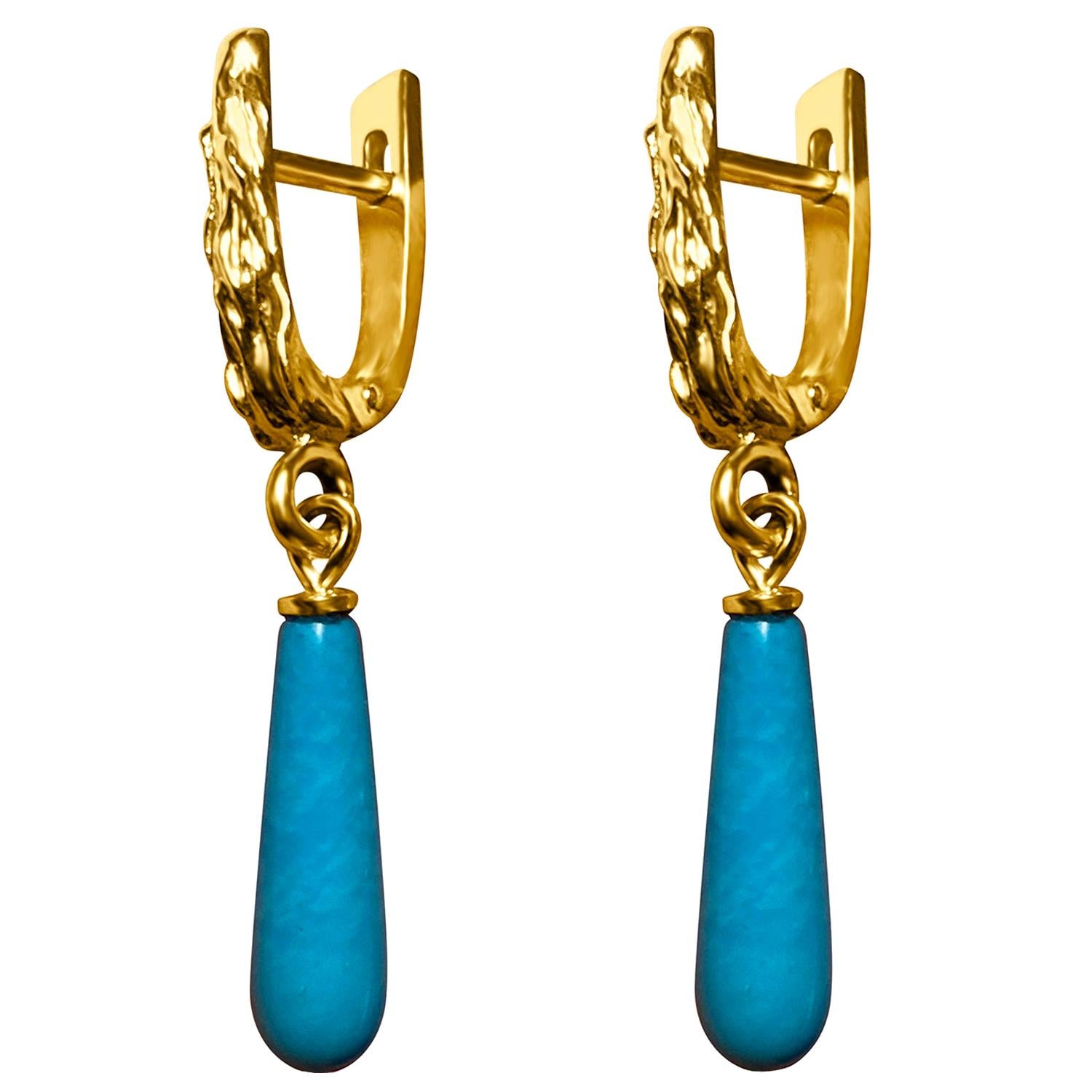 14K yellow gold earrings with natural pear shaped Sleeping beauty Turquoise
turquoise origin - Arizona, United States
gem size is 0.2 х 0.47 in / 5 х 12 mm
earrings weight - 5.19 grams
earrings height - 1.61 in / 41 mm


We ship our jewelry
