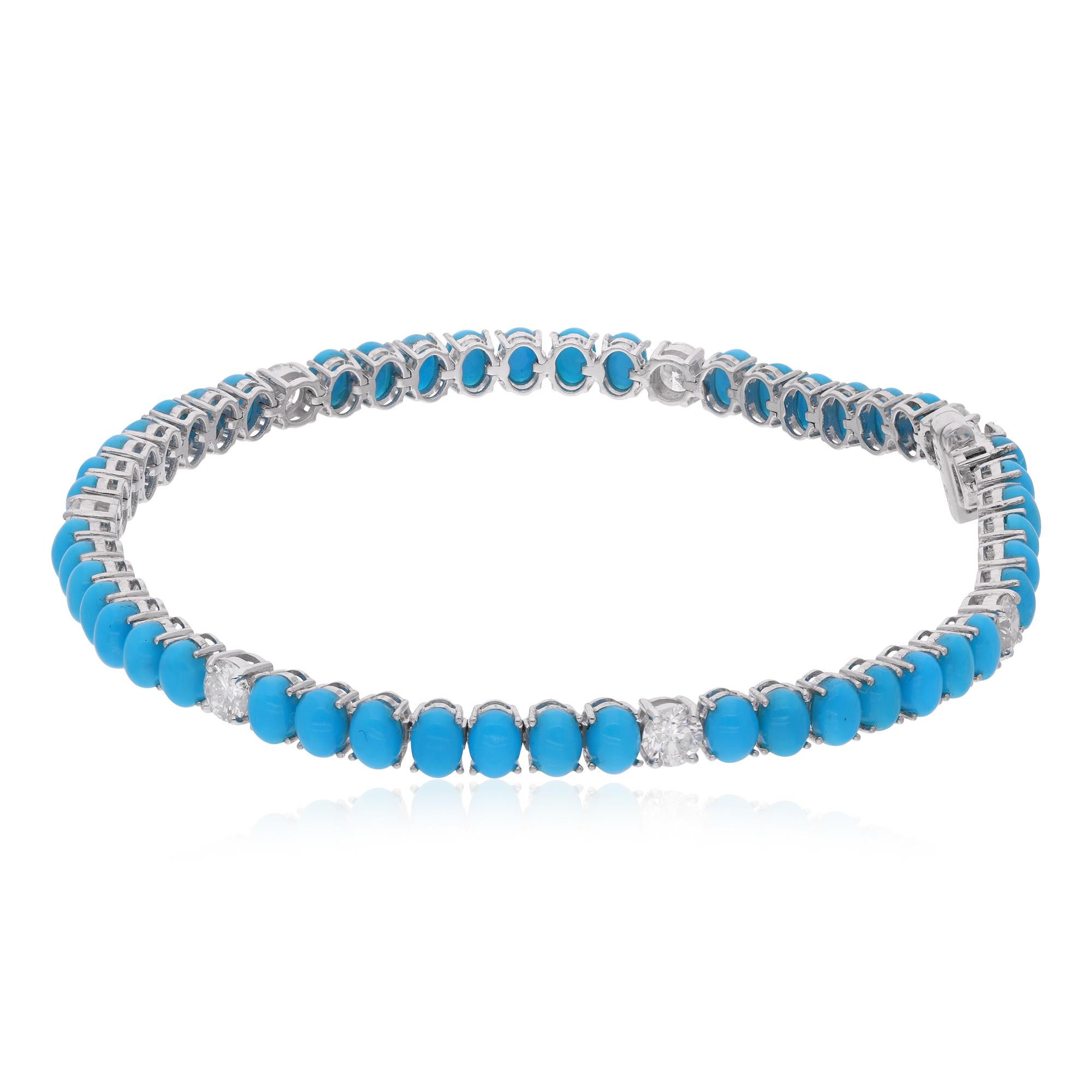 Overall, this piece of jewelry seems to be a luxurious and exquisite creation, combining the elegance of diamonds and the distinct beauty of Arizona turquoise. The use of 14 karat white gold and the handmade aspect further enhance its value and