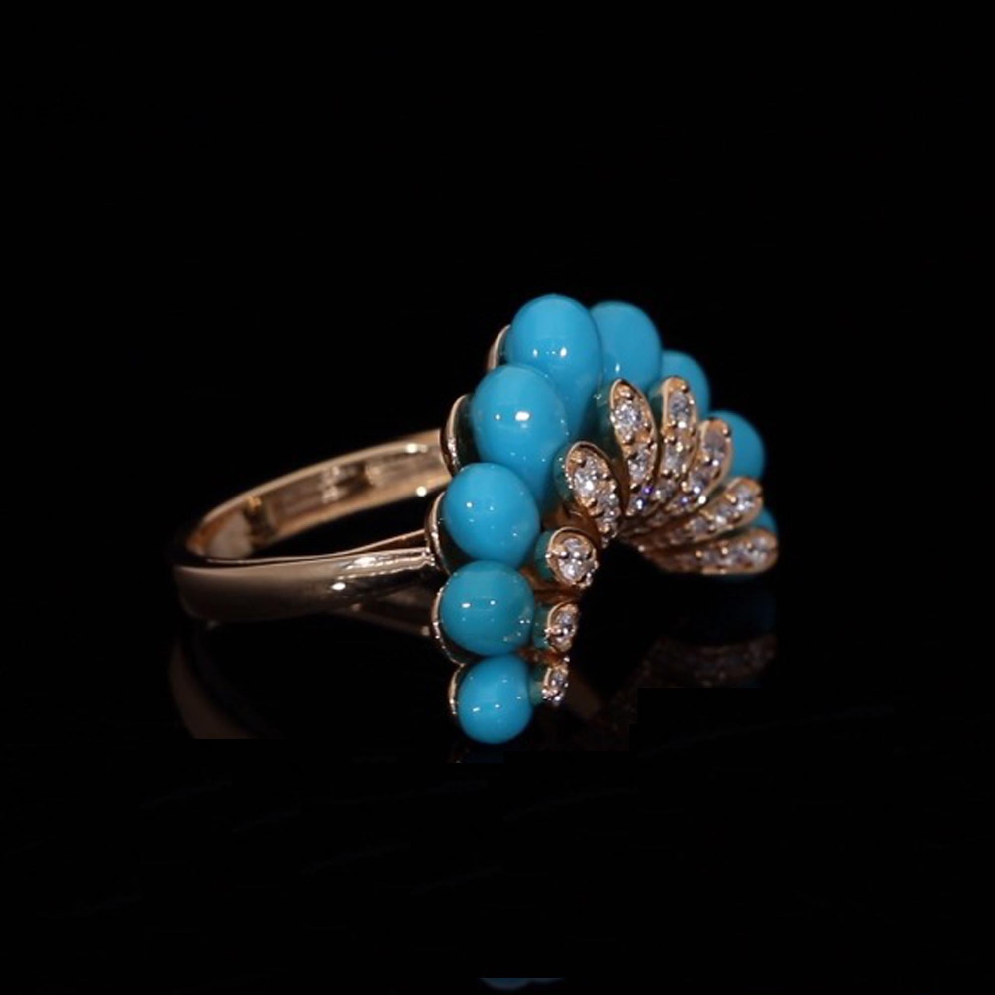 Crafted with precision and attention to detail, the ring is fashioned in luxurious 18 Karat Yellow Gold, adding a warm and radiant glow to the design. The yellow gold setting provides the perfect backdrop for the turquoise and diamonds, creating a