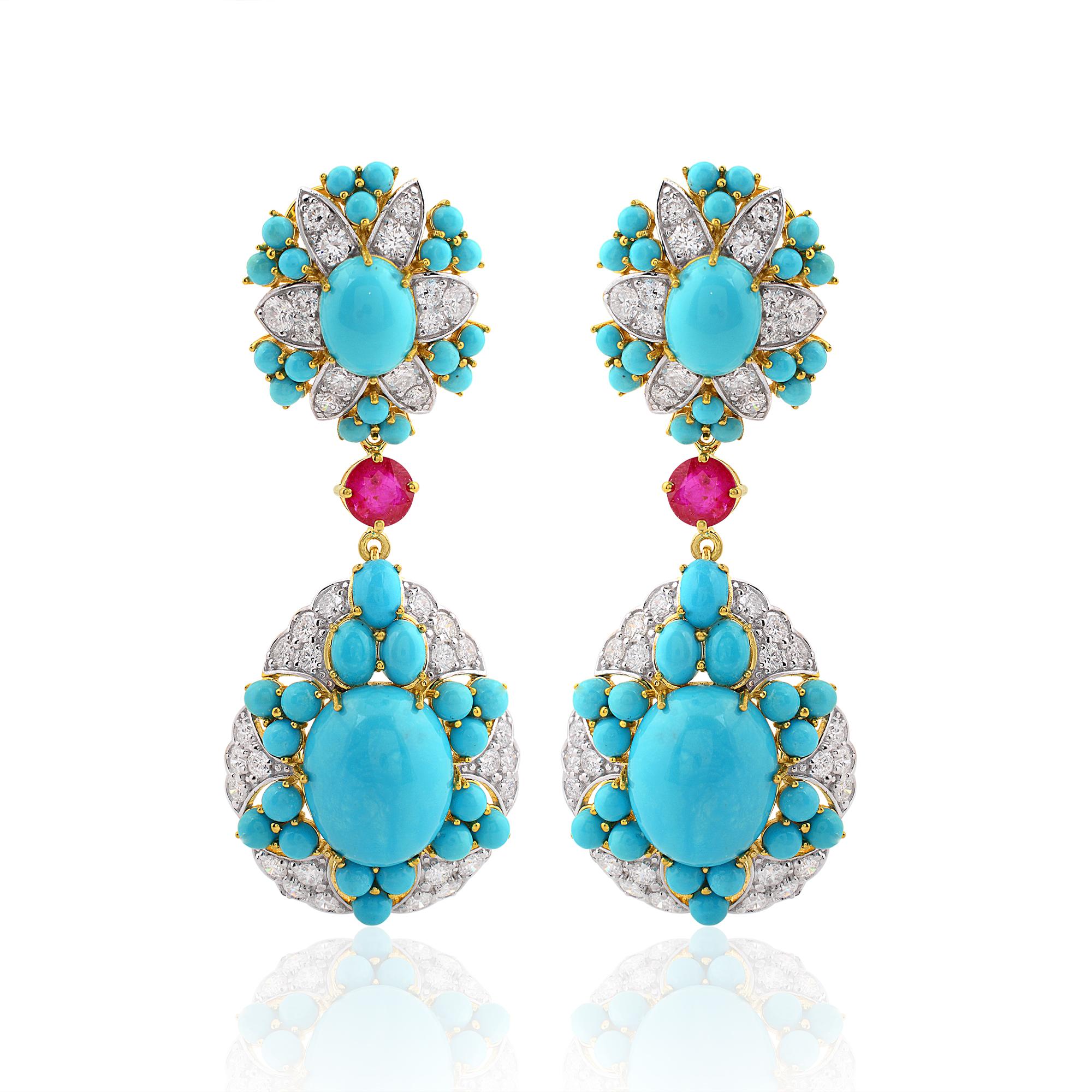 Indulge in the timeless elegance of these exquisite Arizona Turquoise Gemstone Dangle Earrings, adorned with radiant Rubies and Diamonds, set in luxurious 18 Karat Yellow Gold. Crafted with meticulous attention to detail, these earrings are a true