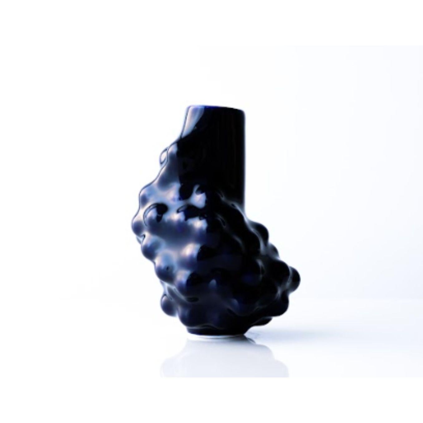 Arkadiusz Szwed Bumps 2.0 Carafe by Nów
Designed by Arkadiusz Szwed
Dimensions: D 14 x W 14 x H 20 cm
Materials: glazed porcelain, cobalt

BUMPS 2.0 is a set of ceramic objects that were created as a result of an experiment with a new, personal