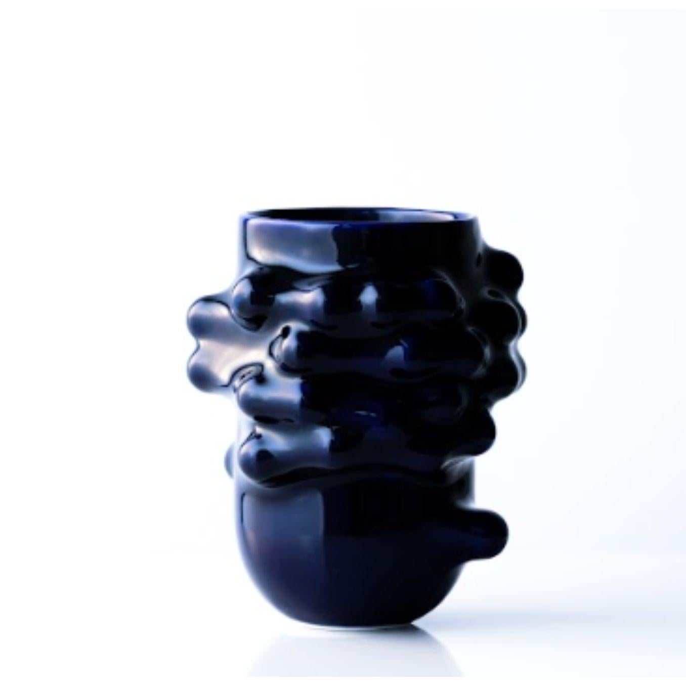 Arkadiusz Szwed Bumps 2.0 Vase by Nów
Designed by Arkadiusz Szwed
Dimensions: D 16 x W 16 x H 20 cm
Materials: glazed porcelain, cobalt

BUMPS 2.0 is a set of ceramic objects that were created as a result of an experiment with a new, personal