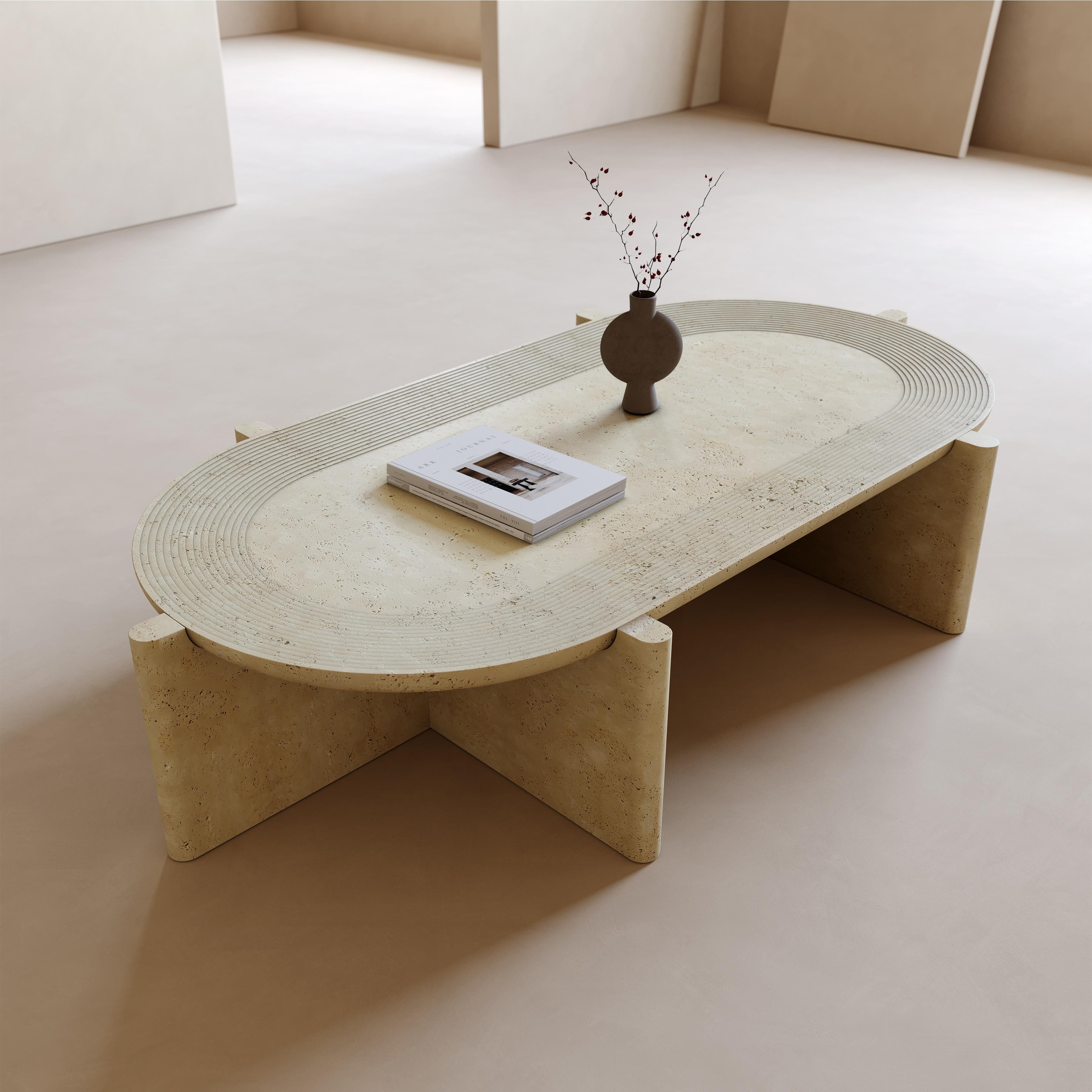 Table basse ovale no 4 en travertin Arkhe par Studio Kali
Dimensions : D 92 x L 172 x H 35 cm.
Matériaux : Travertin.

Il est possible de personnaliser les dimensions et les matériaux. Peut être produit avec différents types de pierre et de marbre