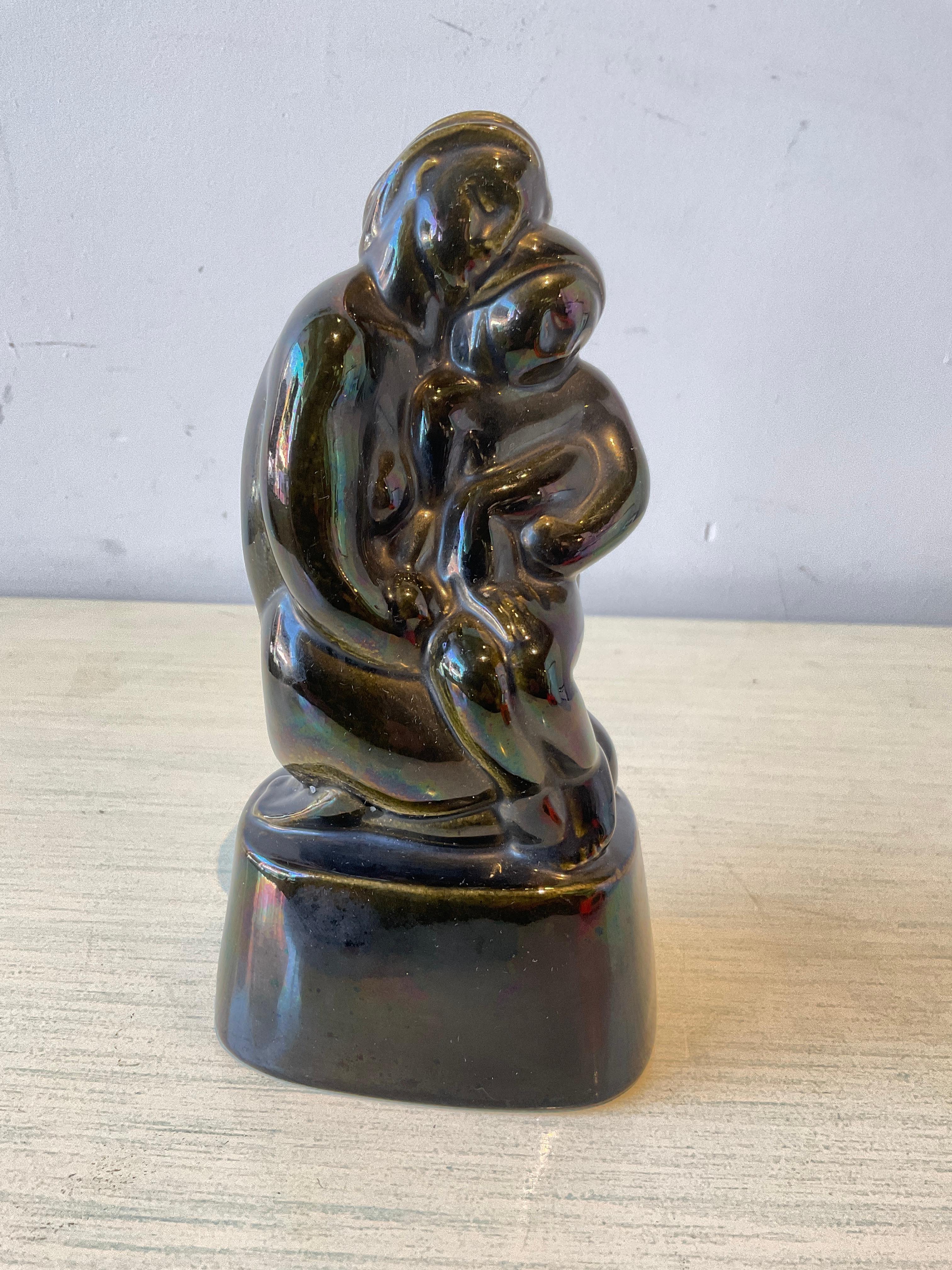 1929 Arko sculpture by N. Berger entitled Maternity. Flake of ceramic gone as shown in image 8.
Arko 