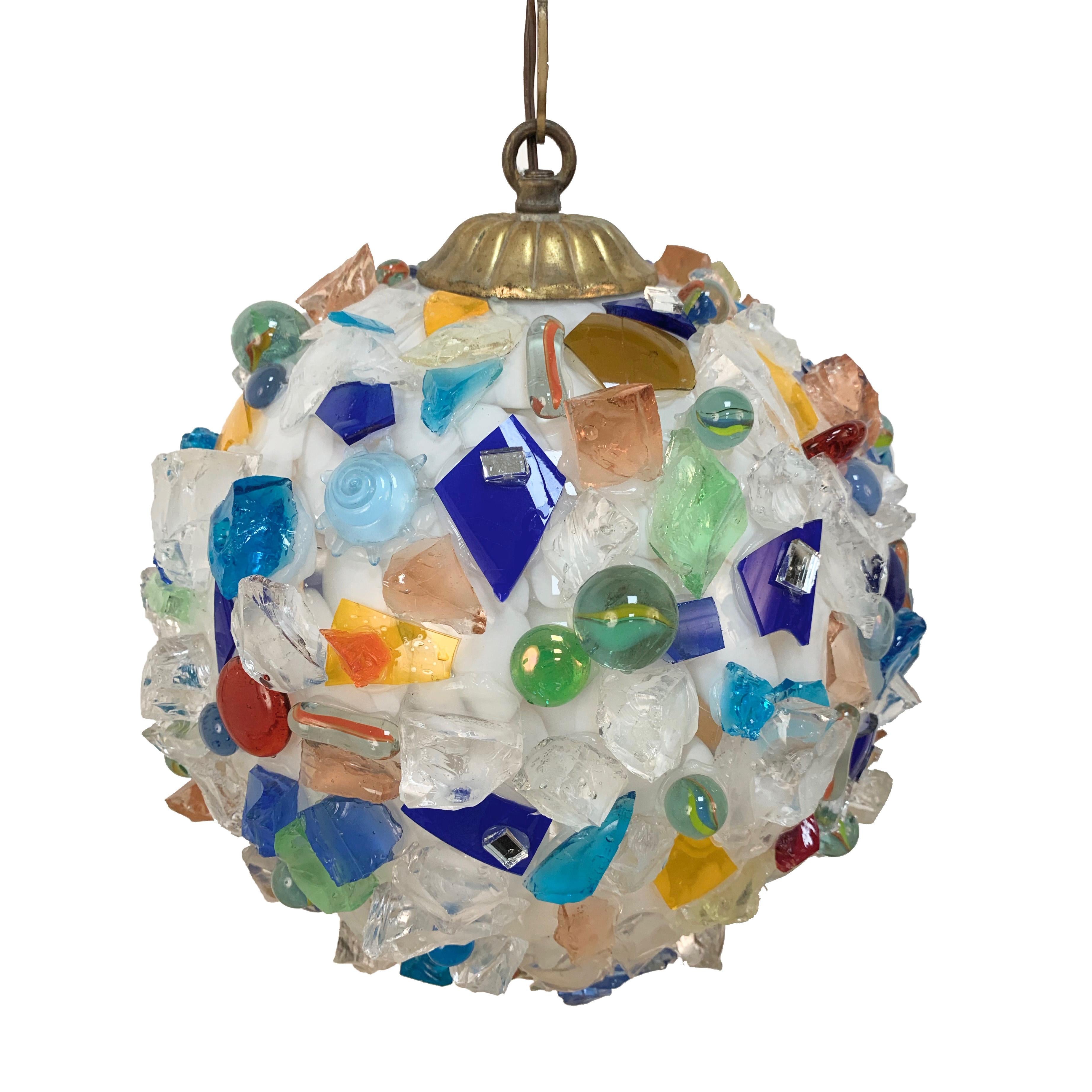 Beautiful and unique Arlecchino ball chandelier. Made with a Murano glass ball and scegge and glass pieces. Beautiful effect both when it is on or even when it is off.