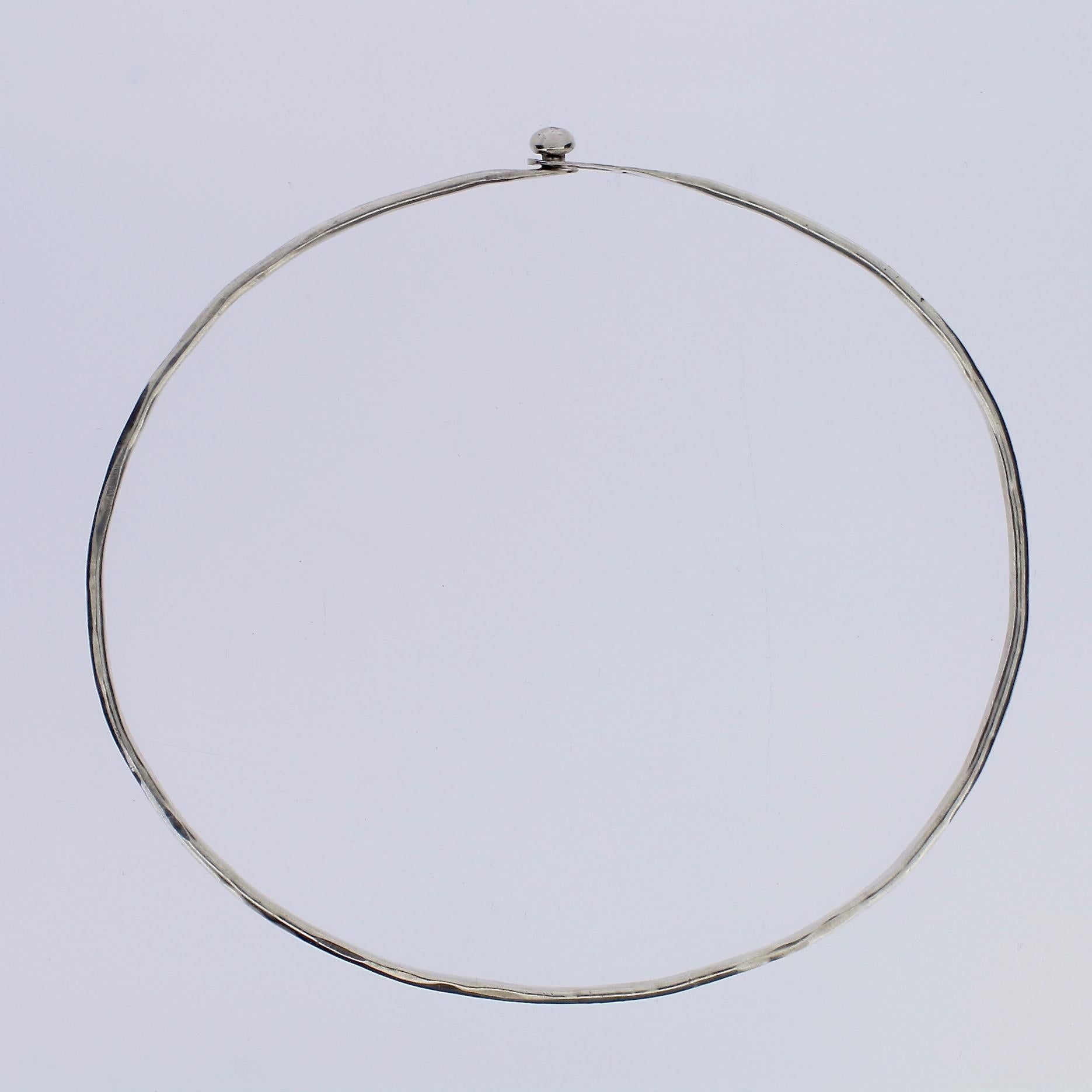 A rare Arline Fisch modernist collar or choker necklace in sterling silver.

Arline Fisch is an important Modernist American artist and jewelry maker based in NYC. Her work is in many of the top public and private collections throughout the world,