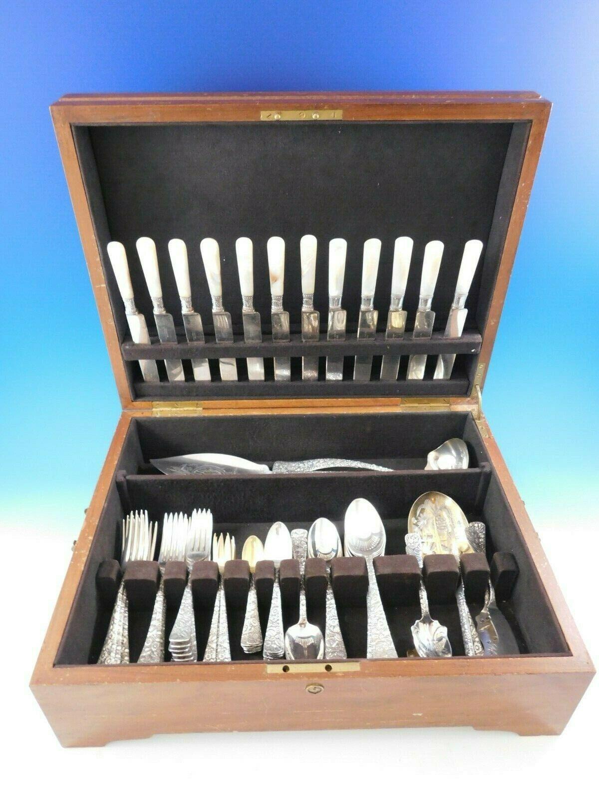 Outstanding multi-motif floral Arlington by Towle circa 1884 sterling silver flatware set, 100 pieces. This set includes:

12 Mother of pearl knives, 2 styles
12 dinner forks, 7 1/2