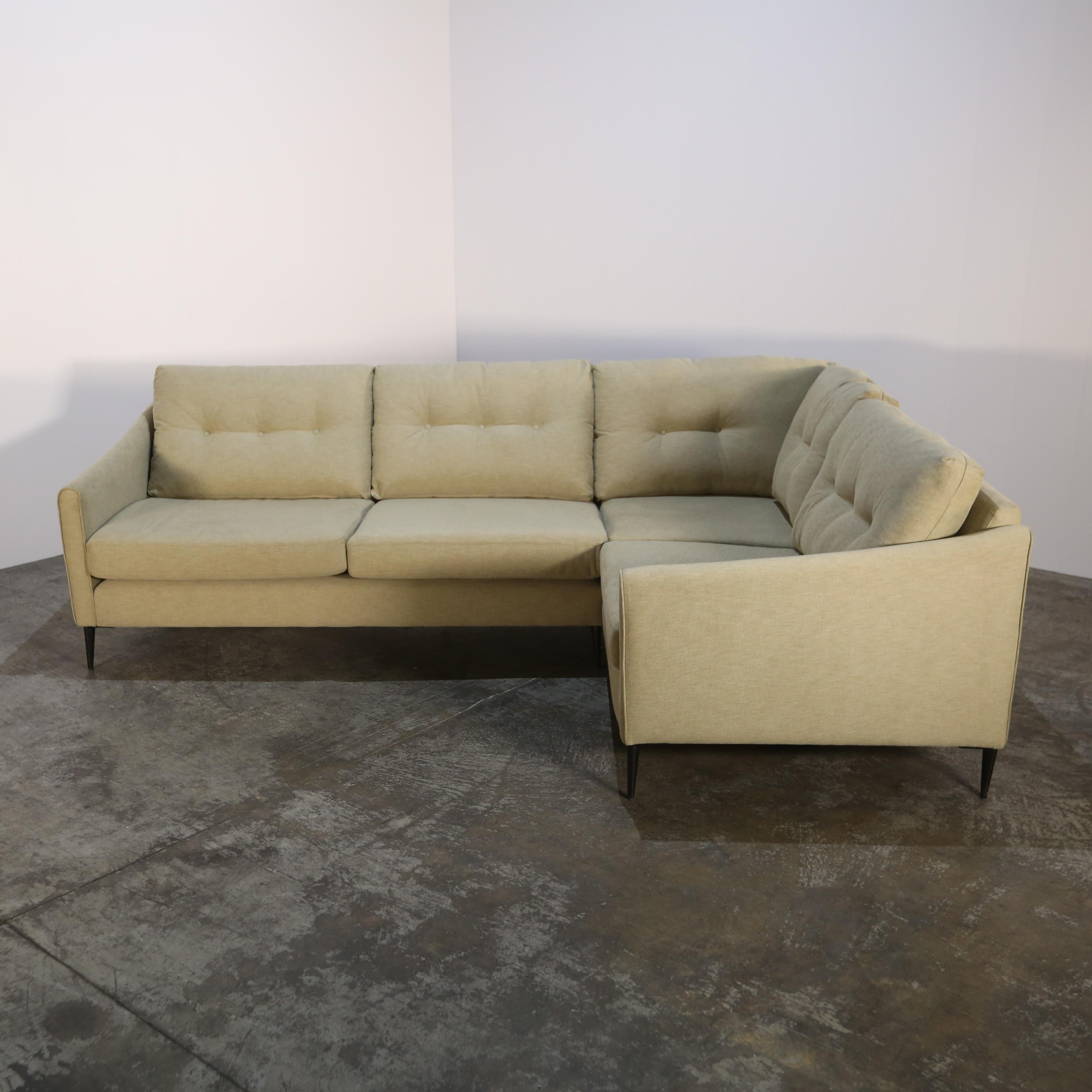 Introducing the Zachary Grande Sofa by Arlo & Jacob, a luxurious addition to any living space. This stunning sofa features a sleek and modern design, with plush cushions and a deep seat for ultimate comfort. The high-quality fabric upholstery comes