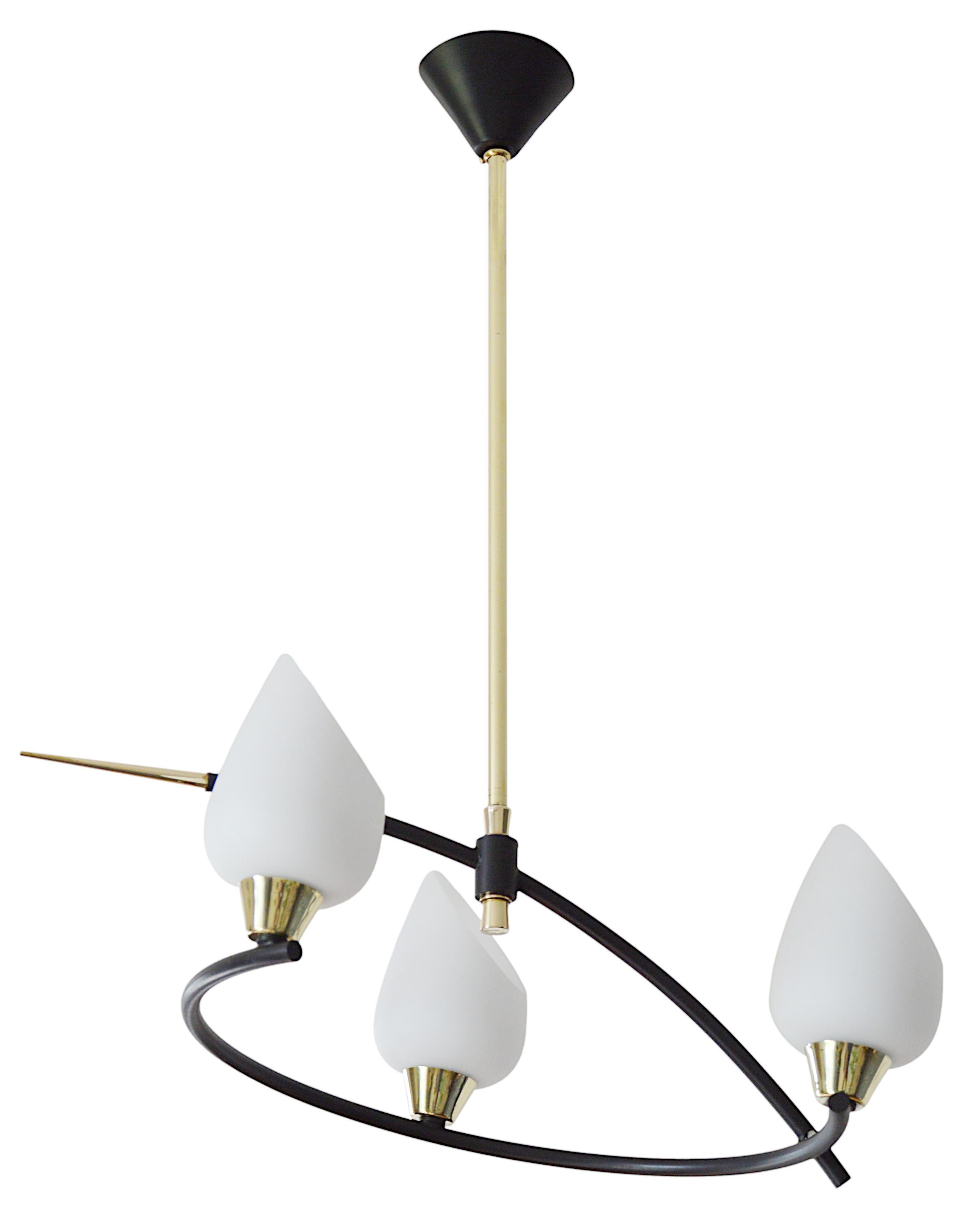French Mid-century chandelier by Arlus (Paris), France, 1950s. 3 lights. Original shades on their metal and brass fixture. Height: 24.4