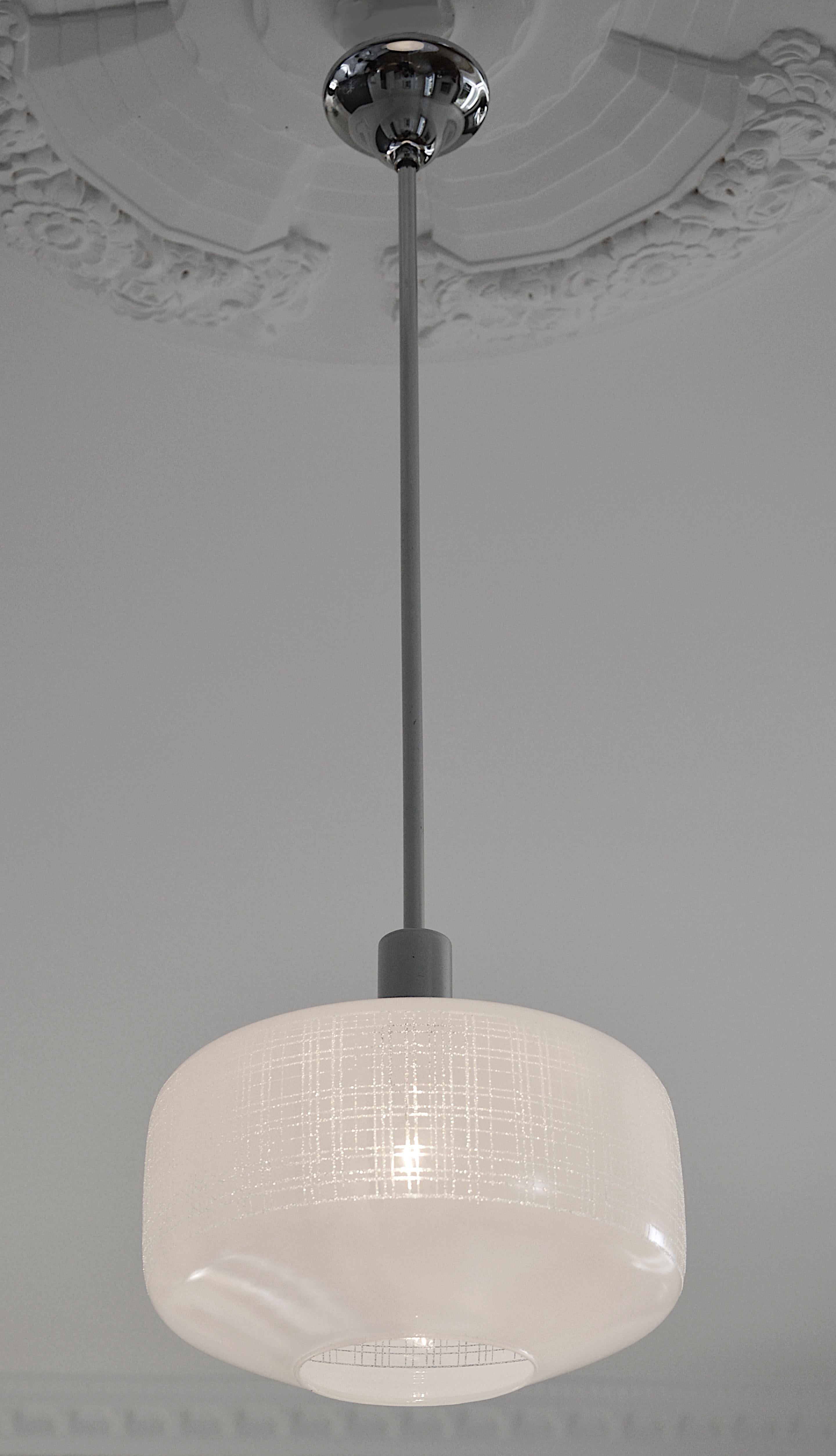 French midcentury ceiling-light pendant by Arlus (Paris), France, 1950s. 1st class refined French style. Typical cylindrical shade hung at its chromed metal fixture. Height 27.5