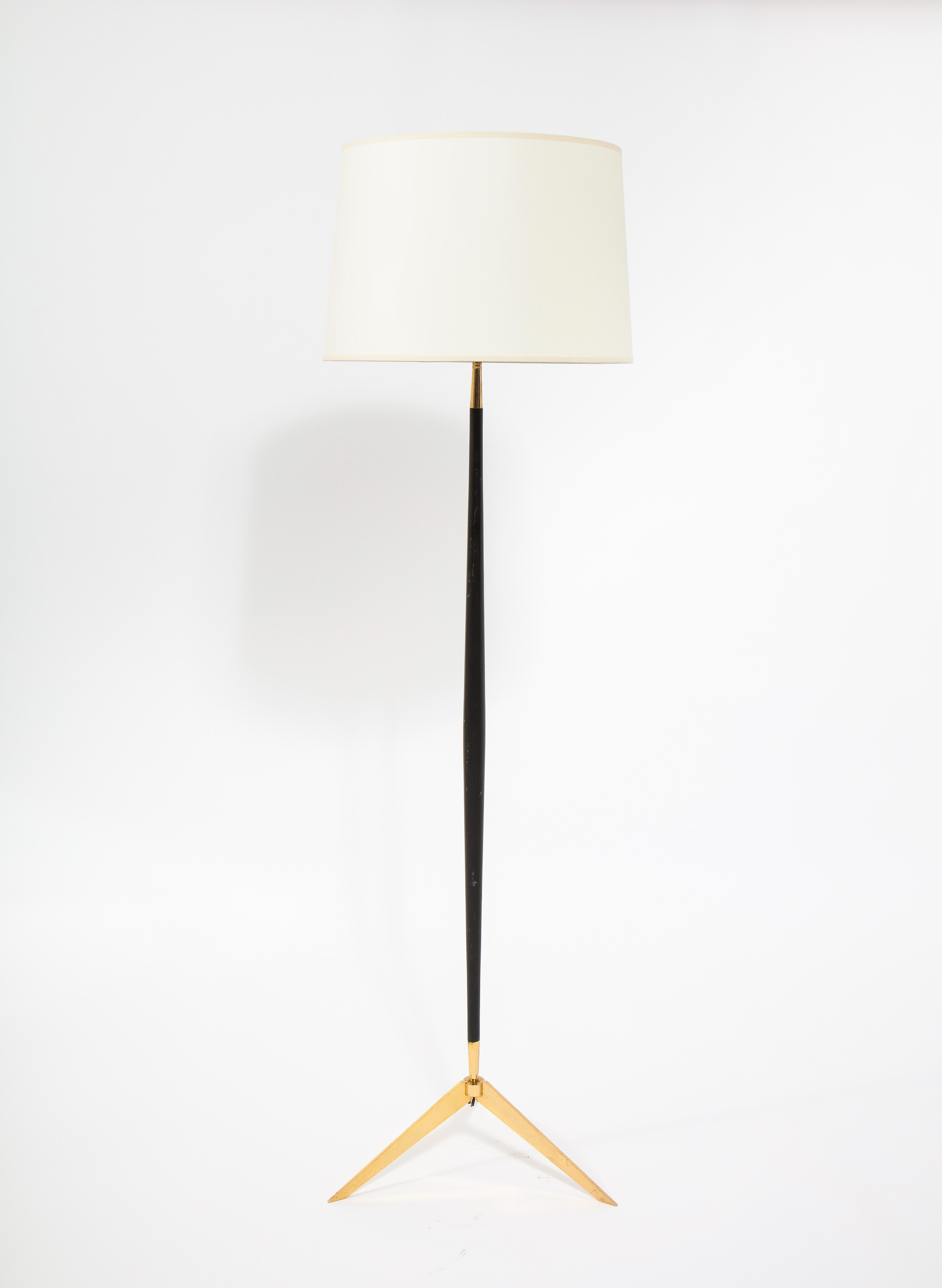 Two tone Arlus tripod standing lamp, the stem is in gunmetal patina while the base is gilt brass. Shade for photographic purposes.