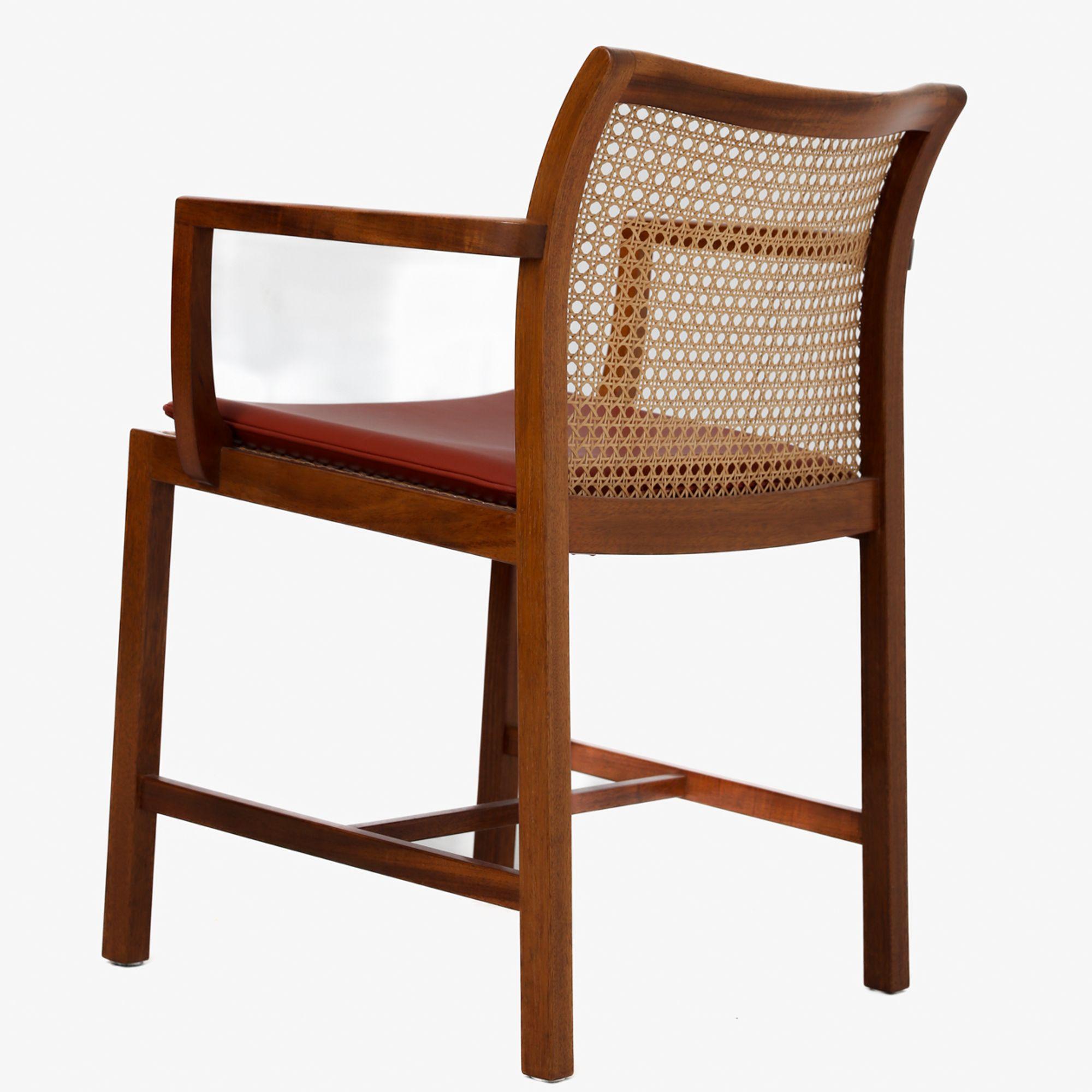 Armchair in solid mahogany with wicker and cushion in red leather. Ditte & Adrian Heath / Søren Horn.