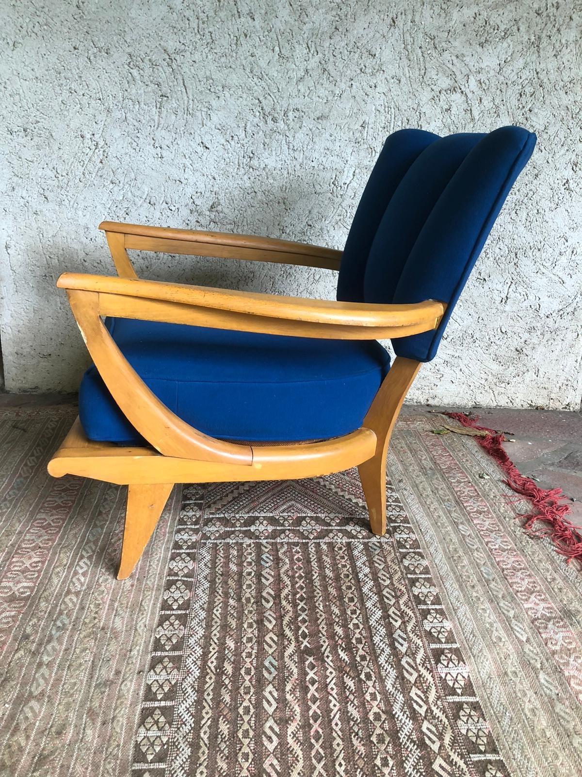 A beechwood armchair by Eienne Henri Martin for Steiner.