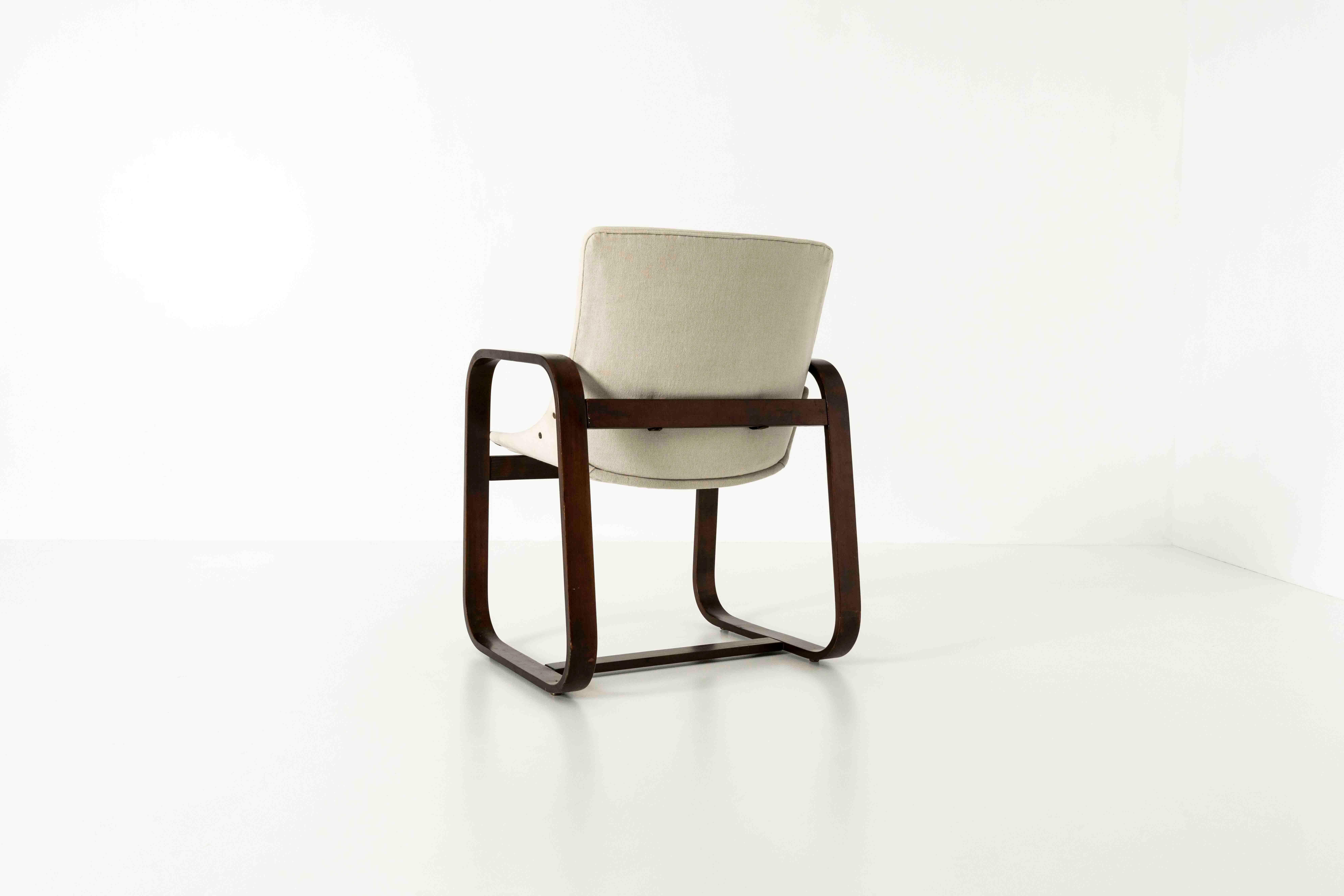 Rare armchair by Giuseppe Pagano Pogatschnig and Gino Maggioni, circa 1940s. The base consists of two square-shaped sides and the chair's legs. This design is very recognizable from the chairs designed by Giuseppe Pagano and Gino Maggioni in the