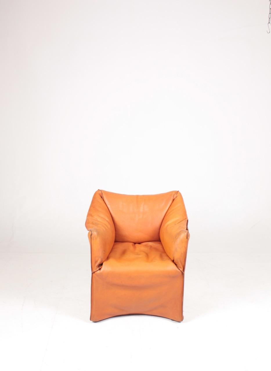 Great looking armchair in leather. Designed Mario Bellini and made by Cassina. Great original condition.