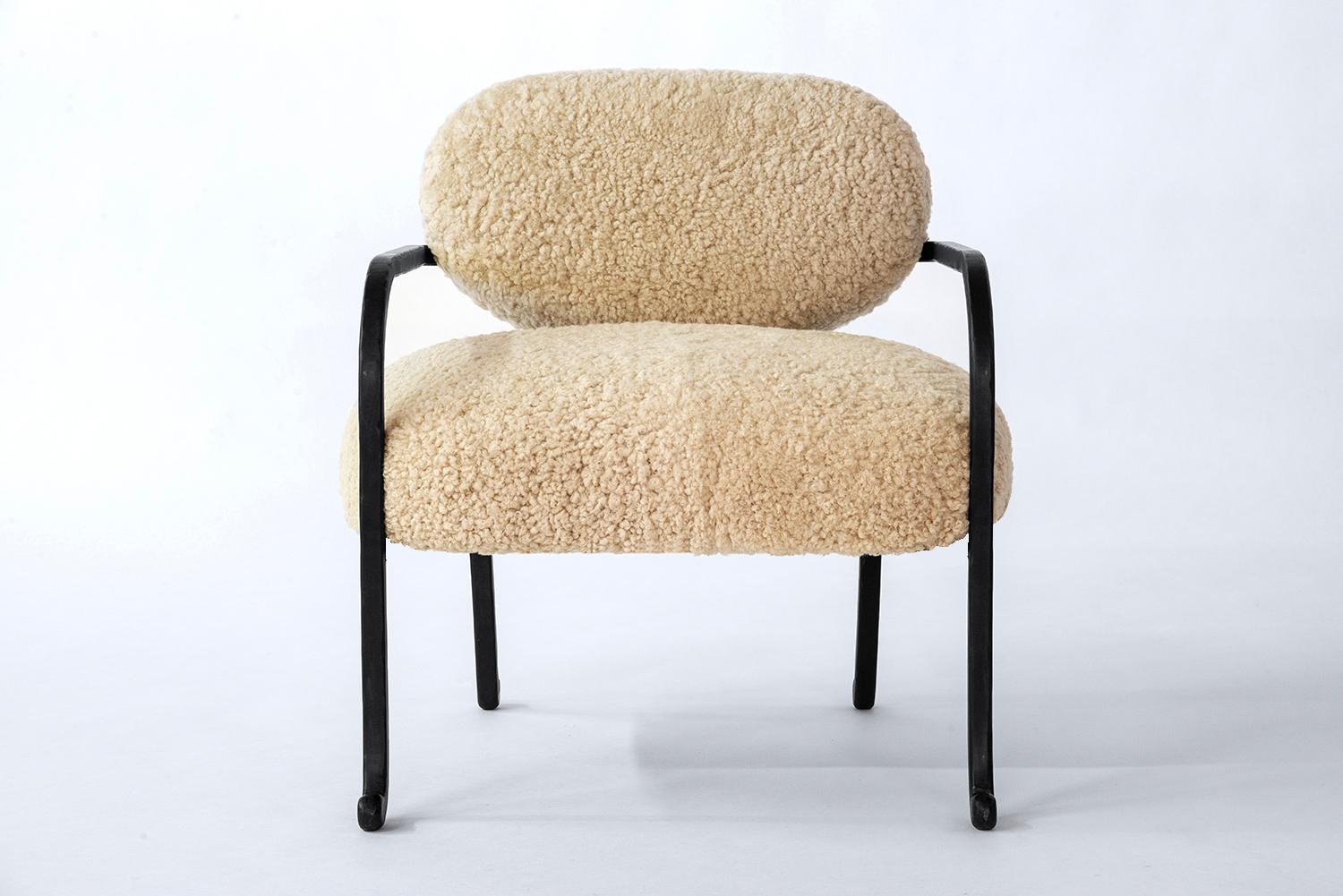 CHAIR NO. 2
J.M. Szymanski
d. 2023

Did you count sheep as a child to fall asleep?  We introduce you to one of these sheep. Hand craved iron is combined with plush shearling to create a new modern classic. Available in shearling (15% fee) or COM.

