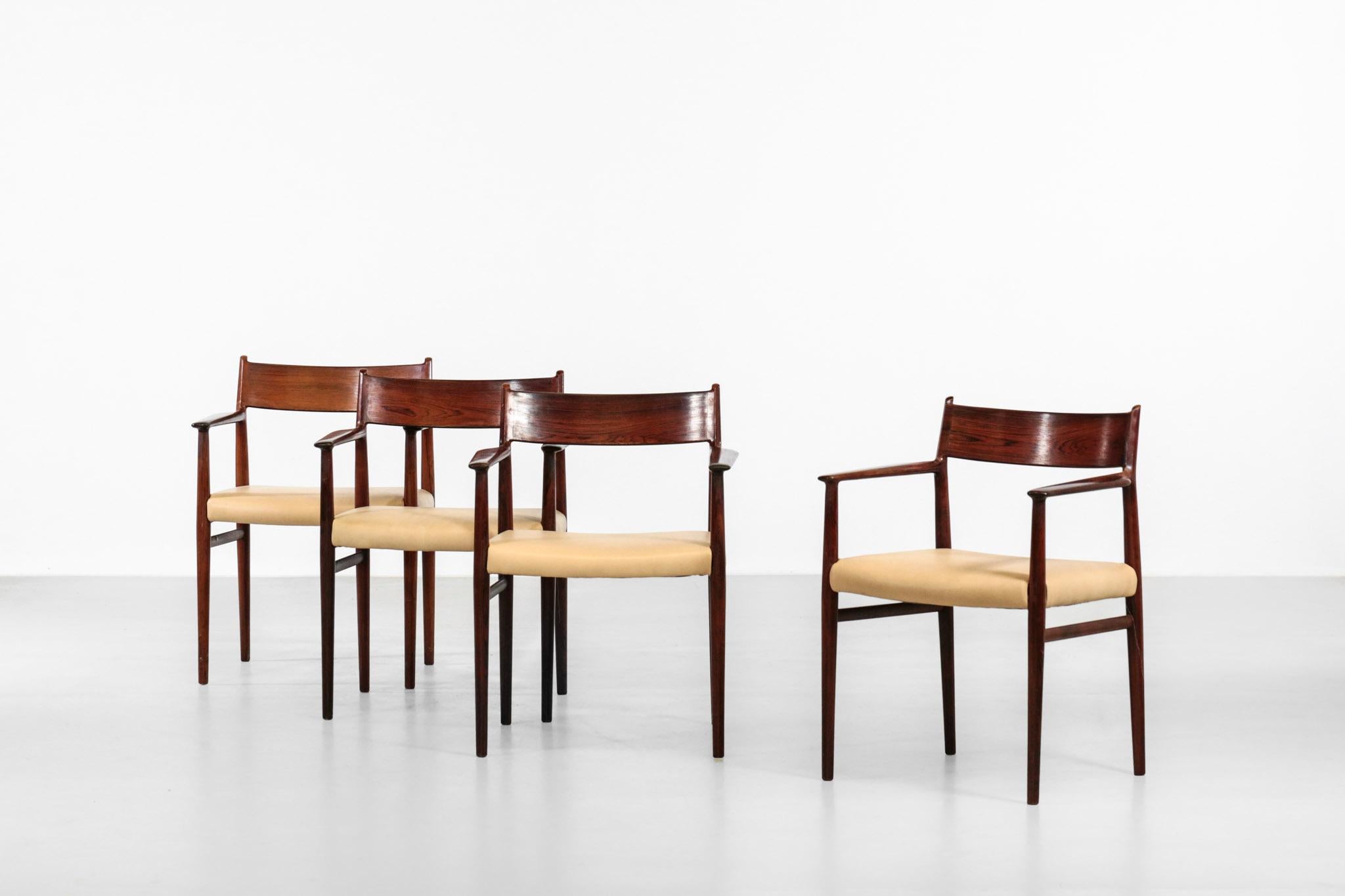 Nice set of 3 chairs with armrest designed by Arne Vodder for Sibast. Composed of rosewood structure with leather seat.