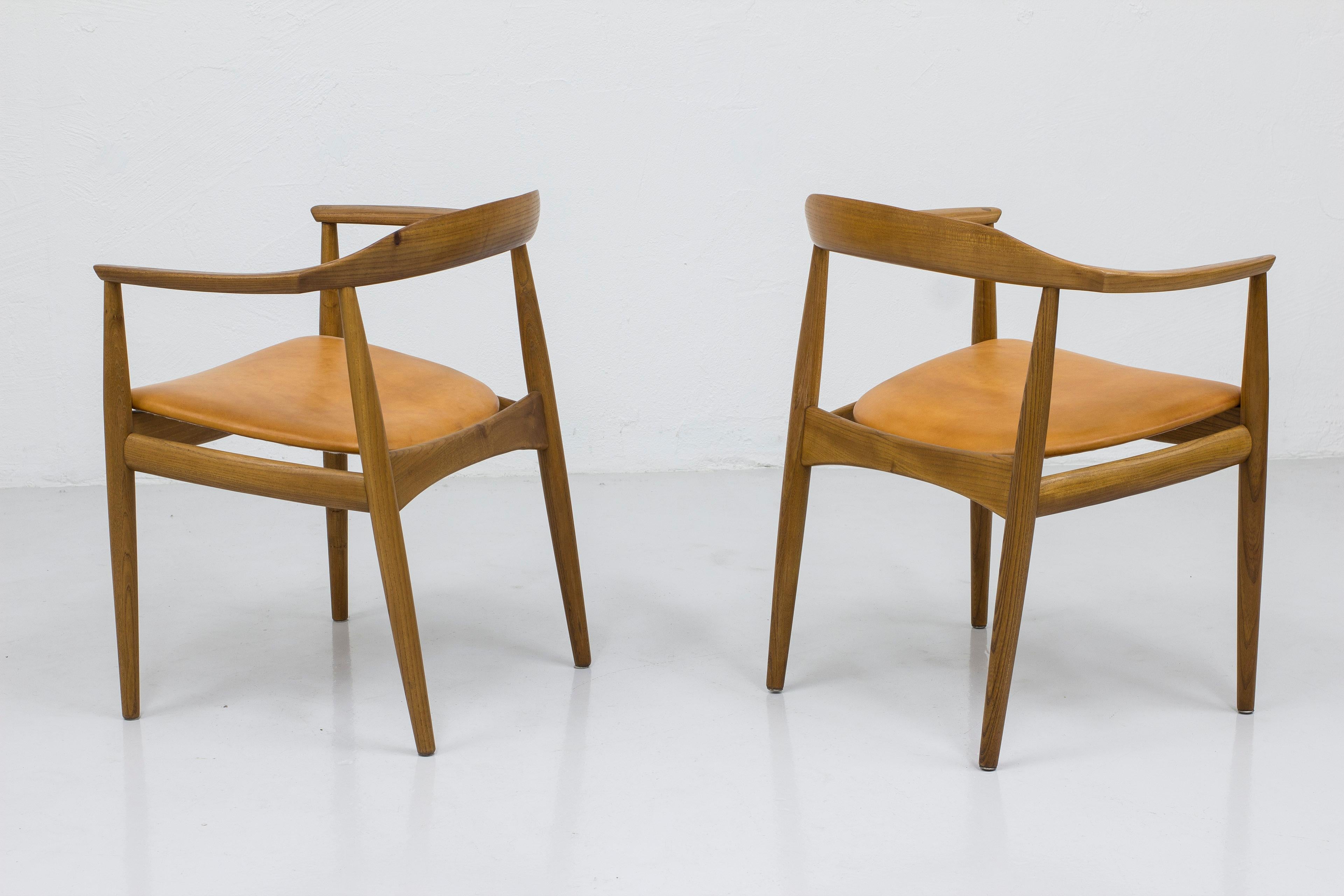 Scandinavian Modern Arm chairs in elm by Arne Wahl Iversen, by cabinetmaker Niels Eilersen, Denmark For Sale