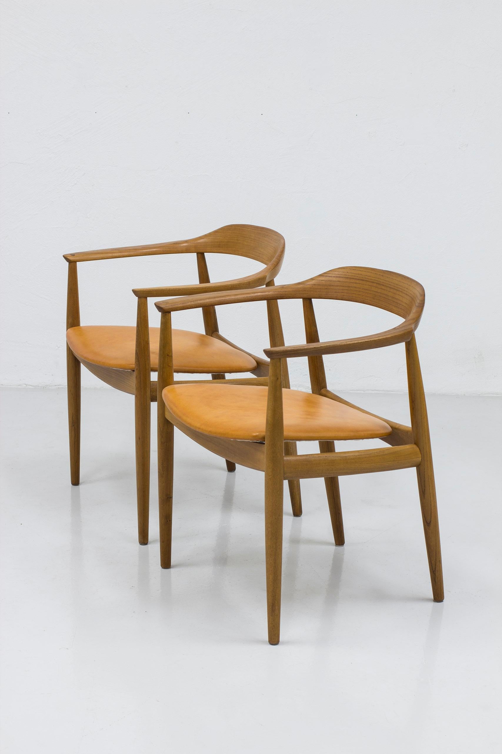 Danish Arm chairs in elm by Arne Wahl Iversen, by cabinetmaker Niels Eilersen, Denmark For Sale