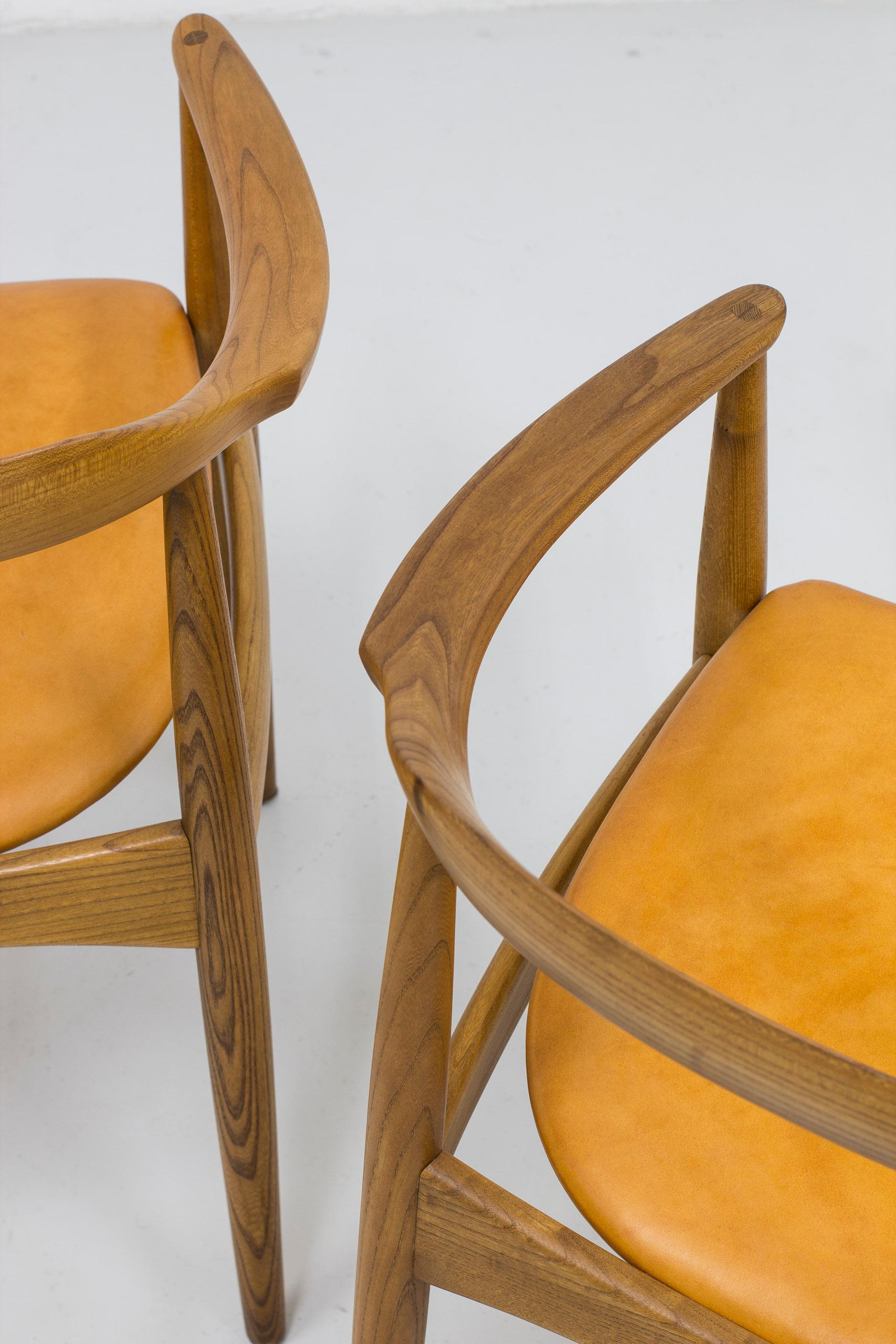 Leather Arm chairs in elm by Arne Wahl Iversen, by cabinetmaker Niels Eilersen, Denmark For Sale
