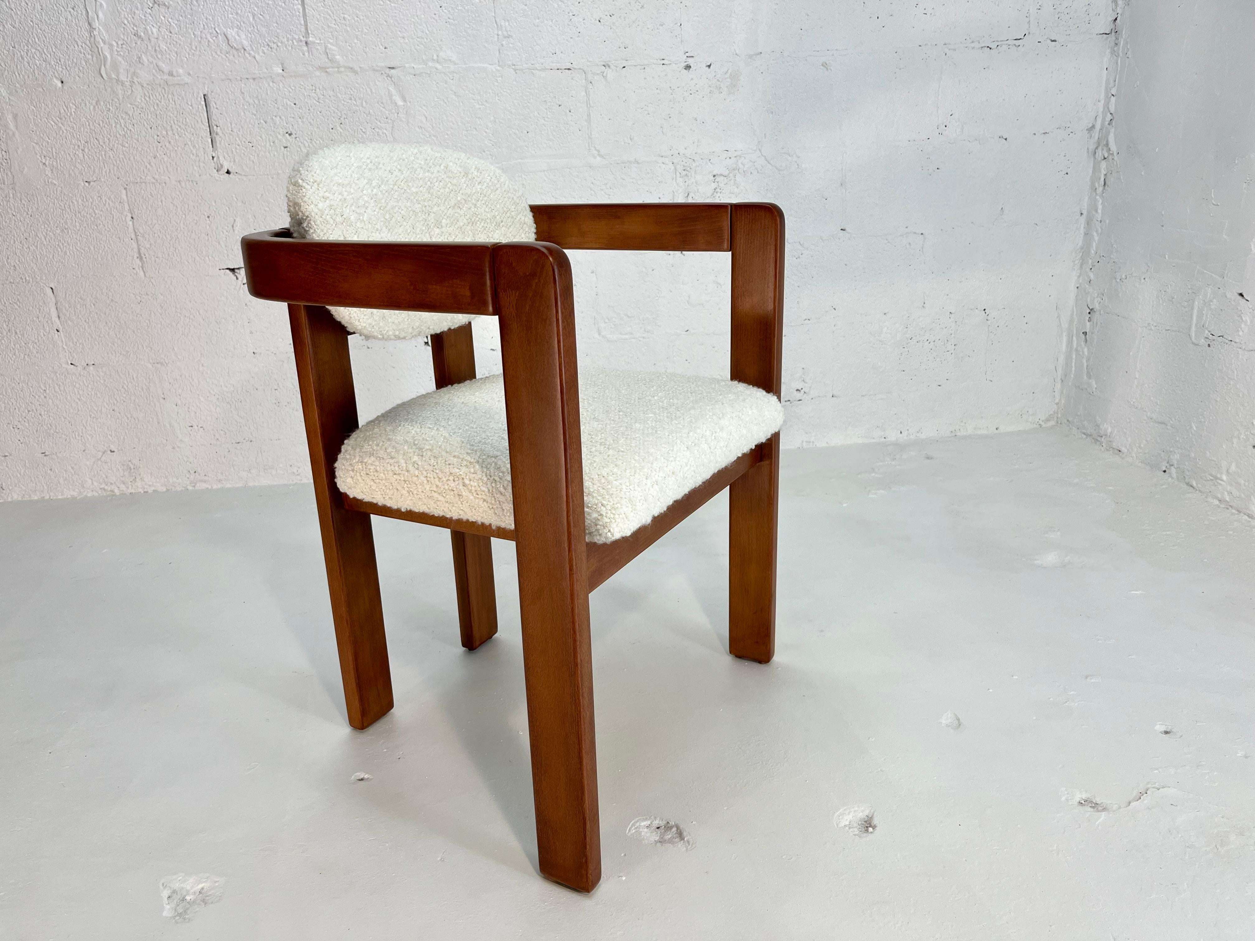 Arm Chairs in the style of Tobia Scarpa, Made in Italy 1970s,
Price is for one chair, in total five chairs available.
Chairs have been refinished. Seats and backs recovered in Kravet Ivory Boucle. Ready for a new home.