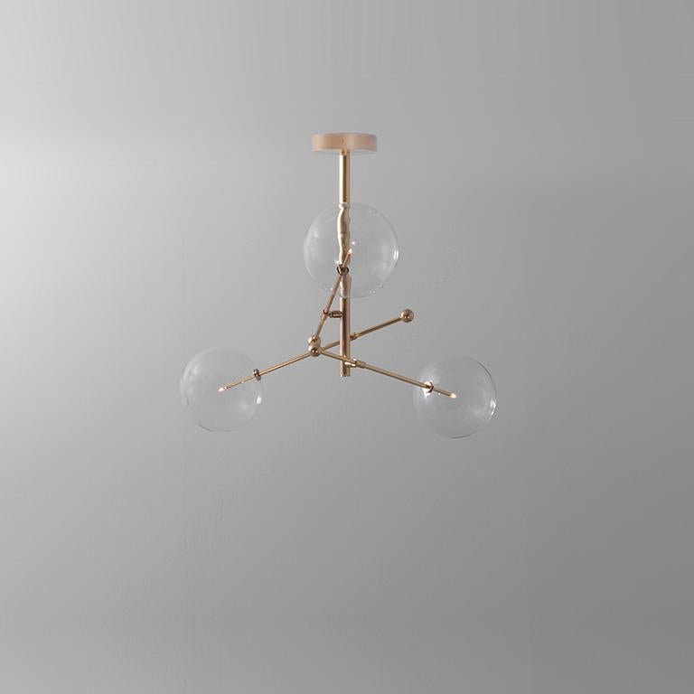 RD15 3 Arms Chandelier by Schwung
Dimensions: W 99 x D 99 x H 53 cm
Materials: Solid brass, hand blown glass globes
Lamp: 3 LED 1,6W

Extension Rods: 1 x 15.24, 1 x 27.9 cm, 1 x 43.2 cm
max wattage 20W / 1.6W
bulb base G4, 12V AC
lumens 600lm
color