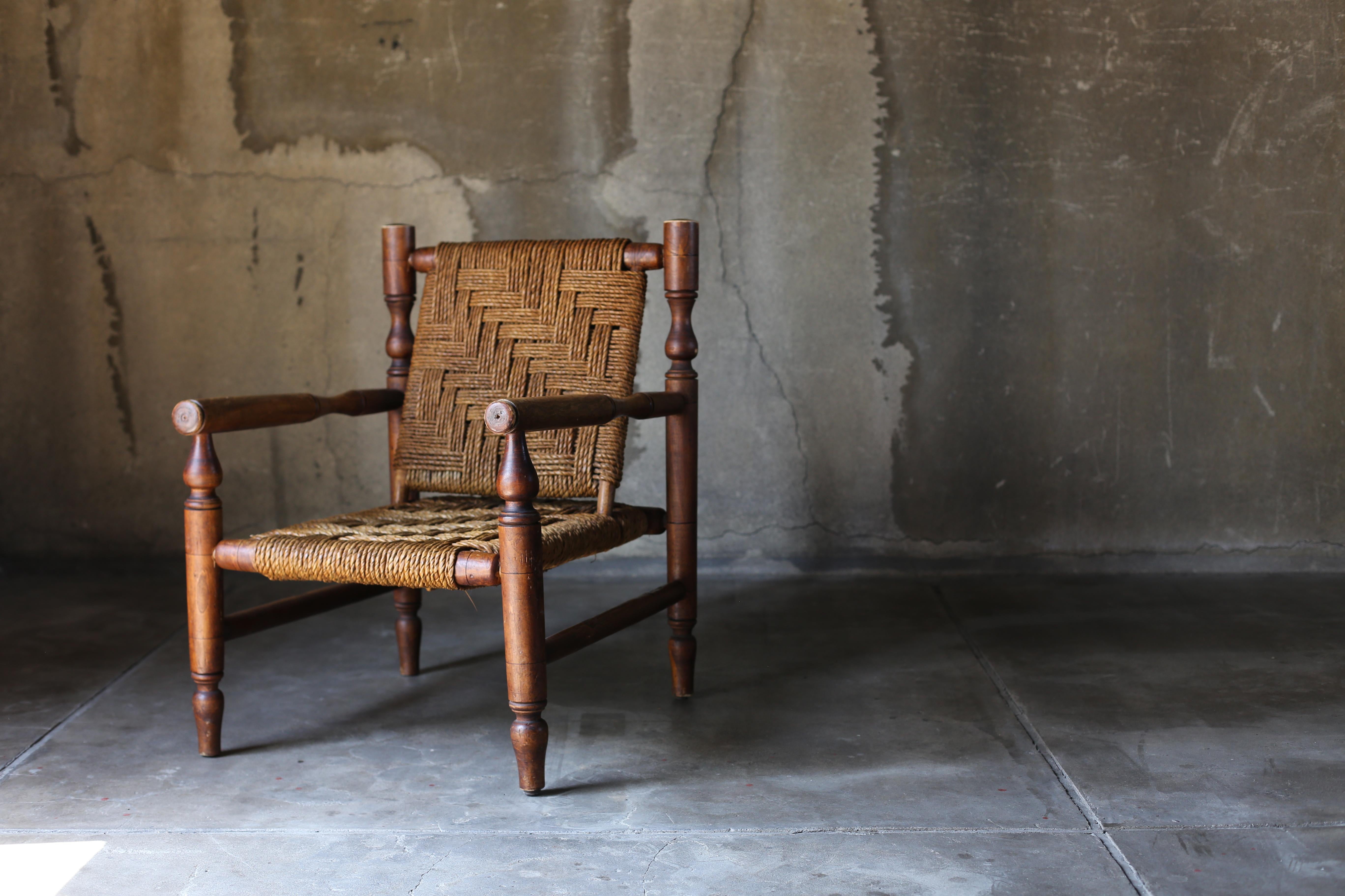 Armchair by Adrien Audoux and Frida Minet.
Made in France, circa 1950s.
Fantastic patina to wood
Beechwood and abaca rope.