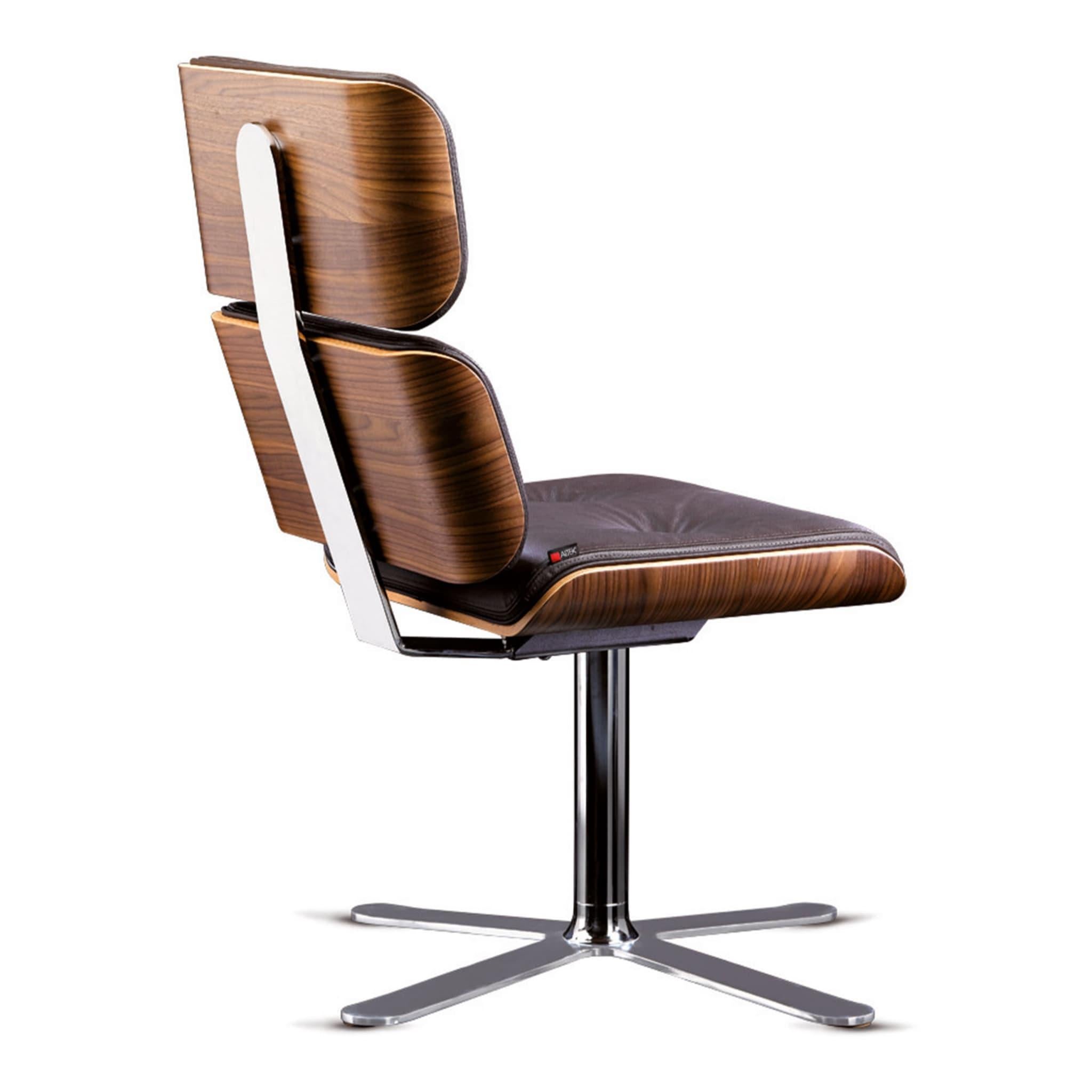 Intrinsically modern, this sleek and elegant office chair is the epitome of comfort. This exclusive design by Rainer Bachshmid features two curved elements on the back and a larger one for the seat made of beech plywood veneer with a Canaletto