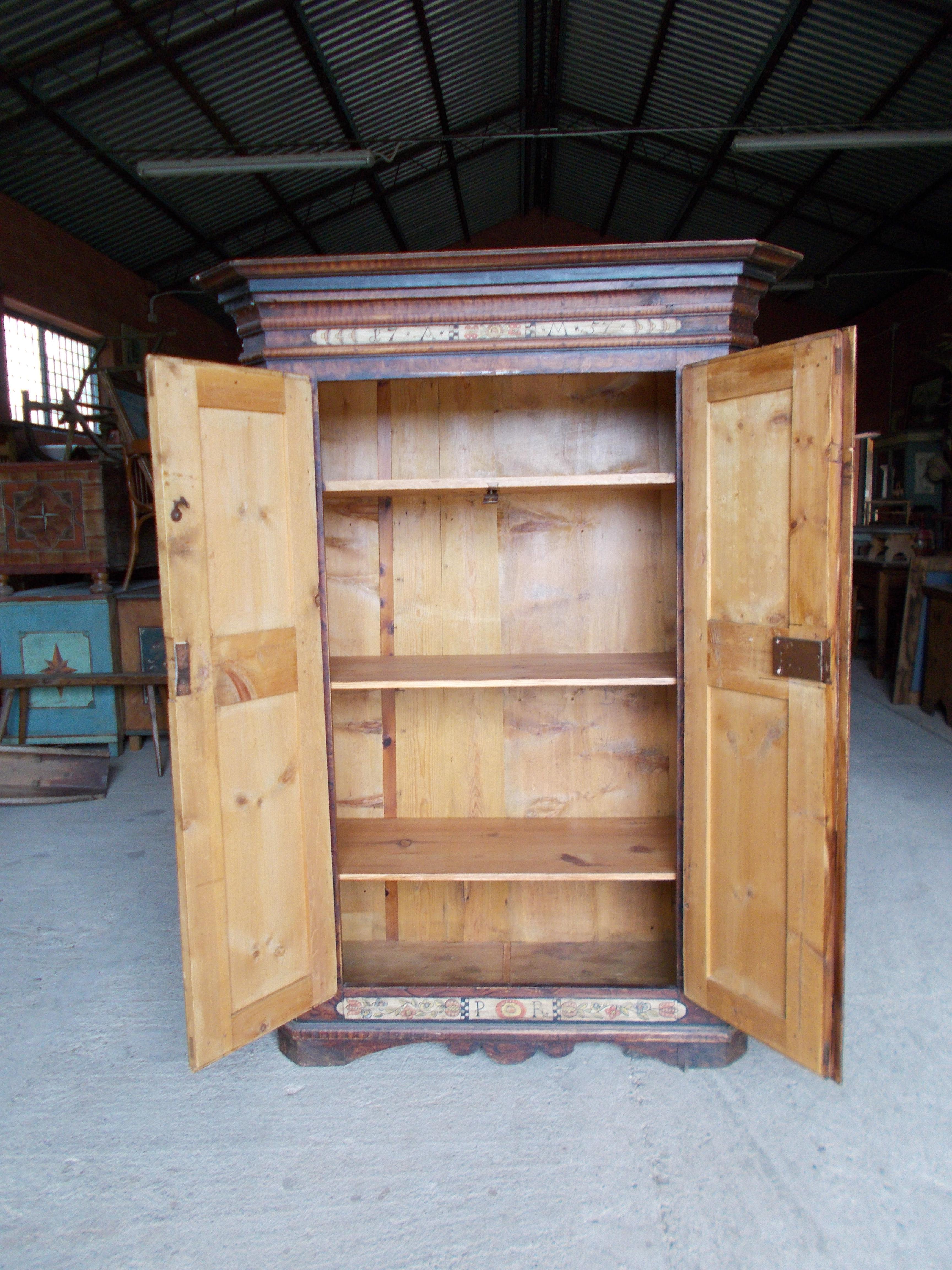 Mid-18th Century Decorated cabinet made of stone pine wood For Sale