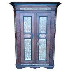 Decorated cabinet made of stone pine wood