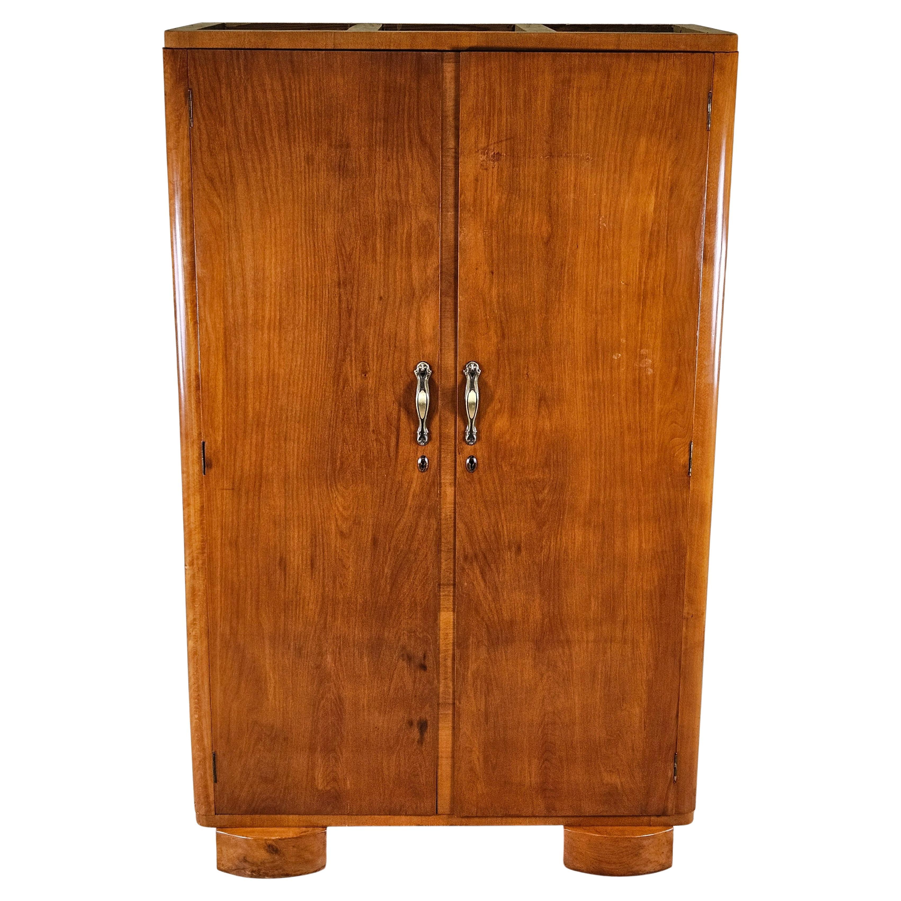 Two-door walnut closet with brass handles 20th century For Sale