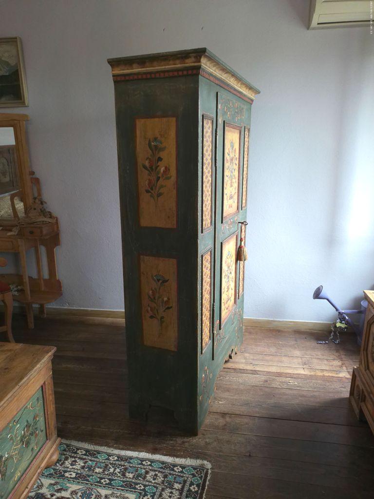 Folk Art Spruce cabinet with floral painted relief frames For Sale