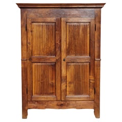 Piedmontese walnut cabinet with fluted doors, late 18th century Piedmontese walnut cabinet with fluted doors, late 18th century