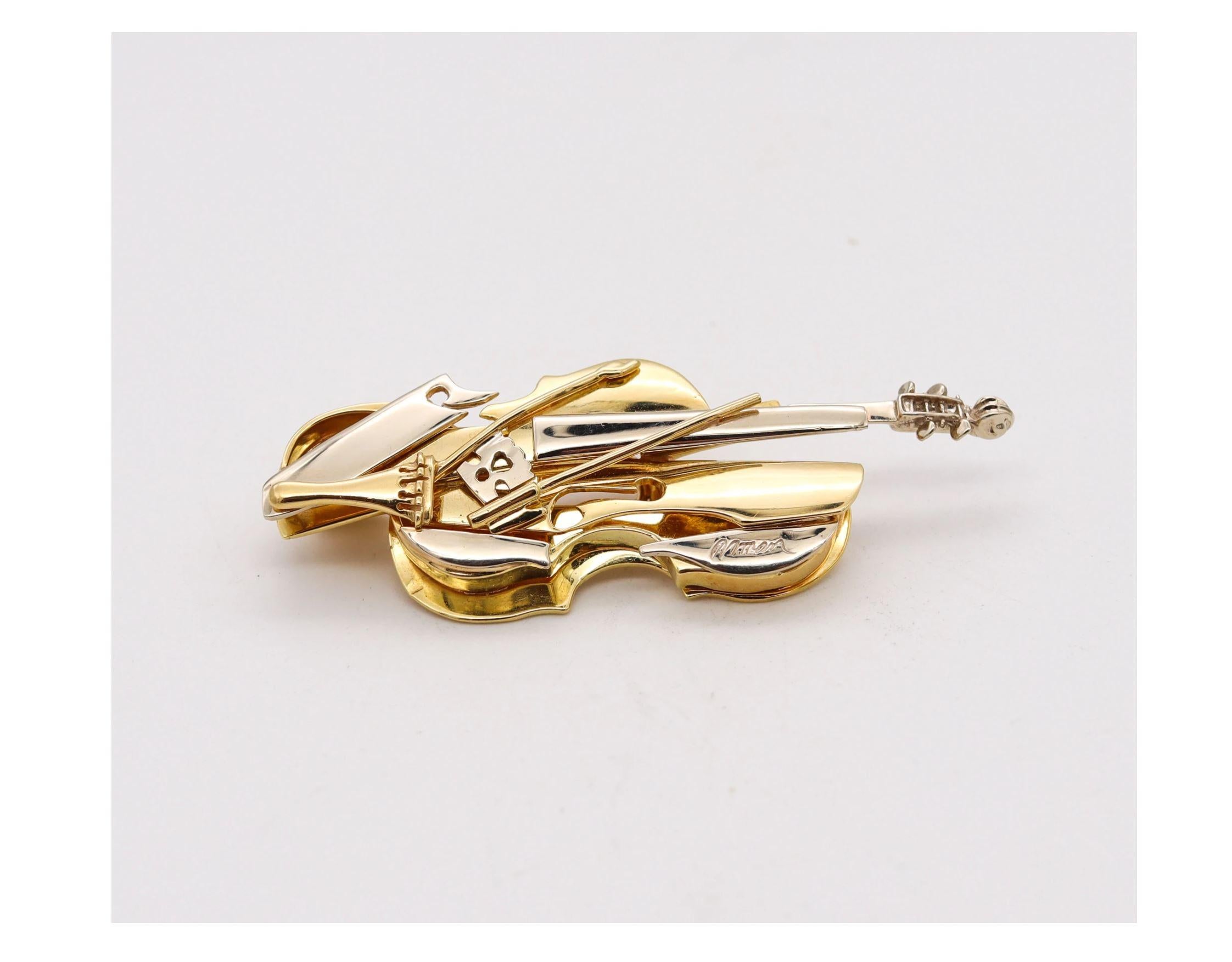 Deconstructed violin brooch designed by Pierre Arman (1928-2005)

Very rare wearable piece of art, created by Pierre Arman, back in the 1970's. The design of this jewelry brooch is composed by the deconstructed figure of a violin or cello, showing