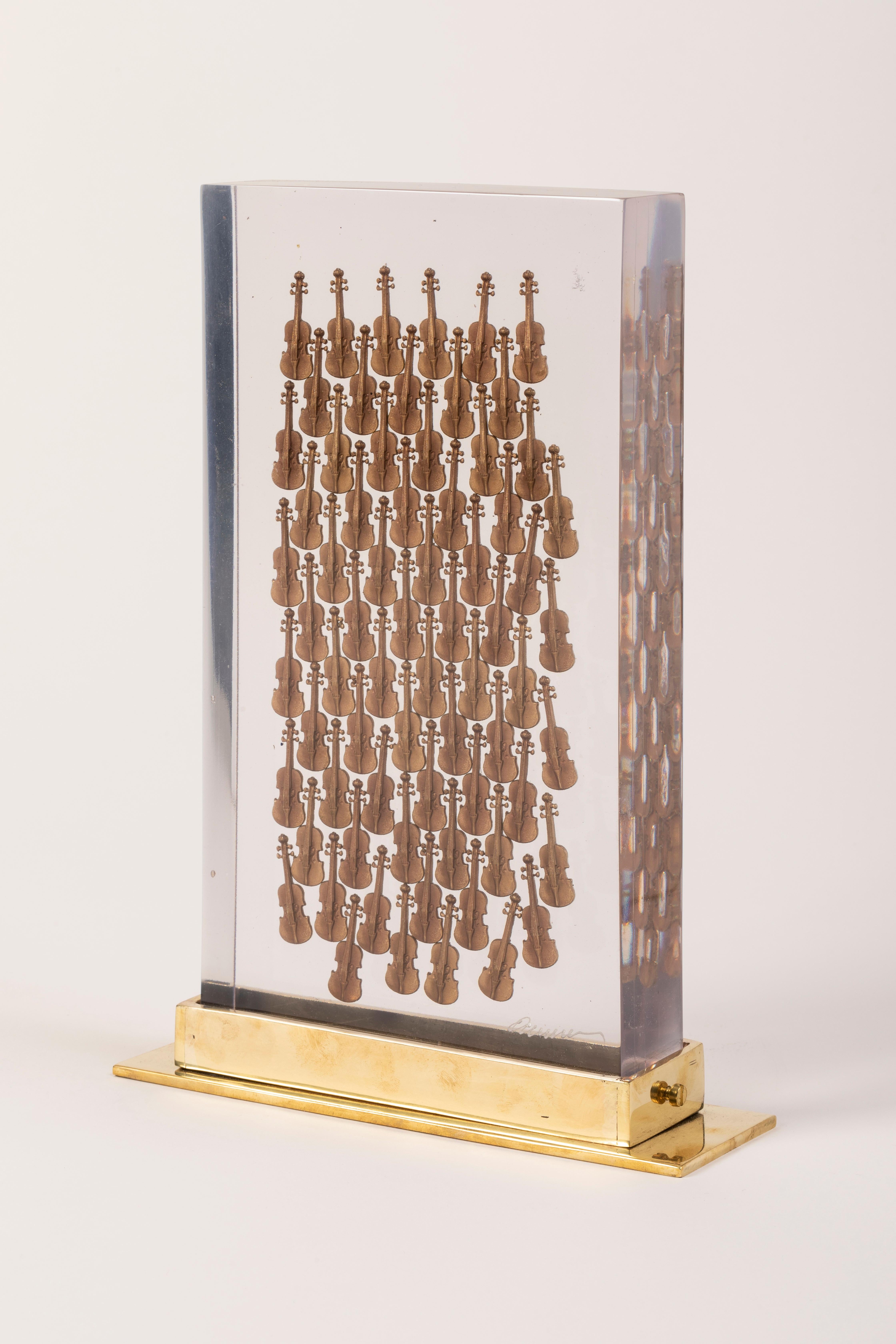 2004
Accumulation of miniature bronze violins embedded in polyester resin.
Edition of 99 copies + 20 AP + 20 HC + 30 I/XXX.
Signed and numbered in resin.
Registered in Denyse Durand-Ruel Archives under Nr 9530.

Arman is a Franco-American artist