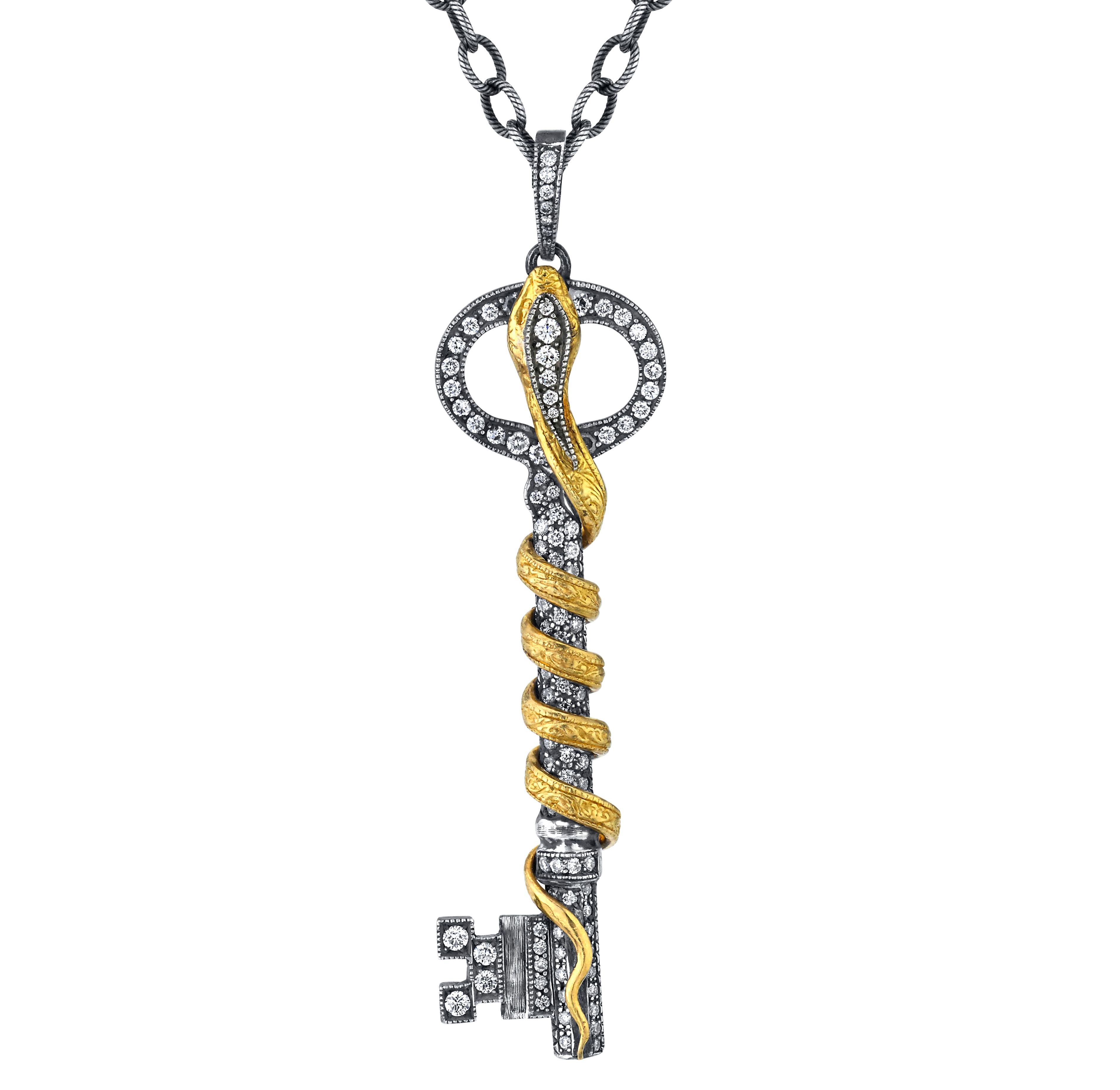Key pendant with gold snake and diamonds in 22k gold and oxidized silver. 
Diamonds 1.53ct 
Designed and handmade in Los Angeles