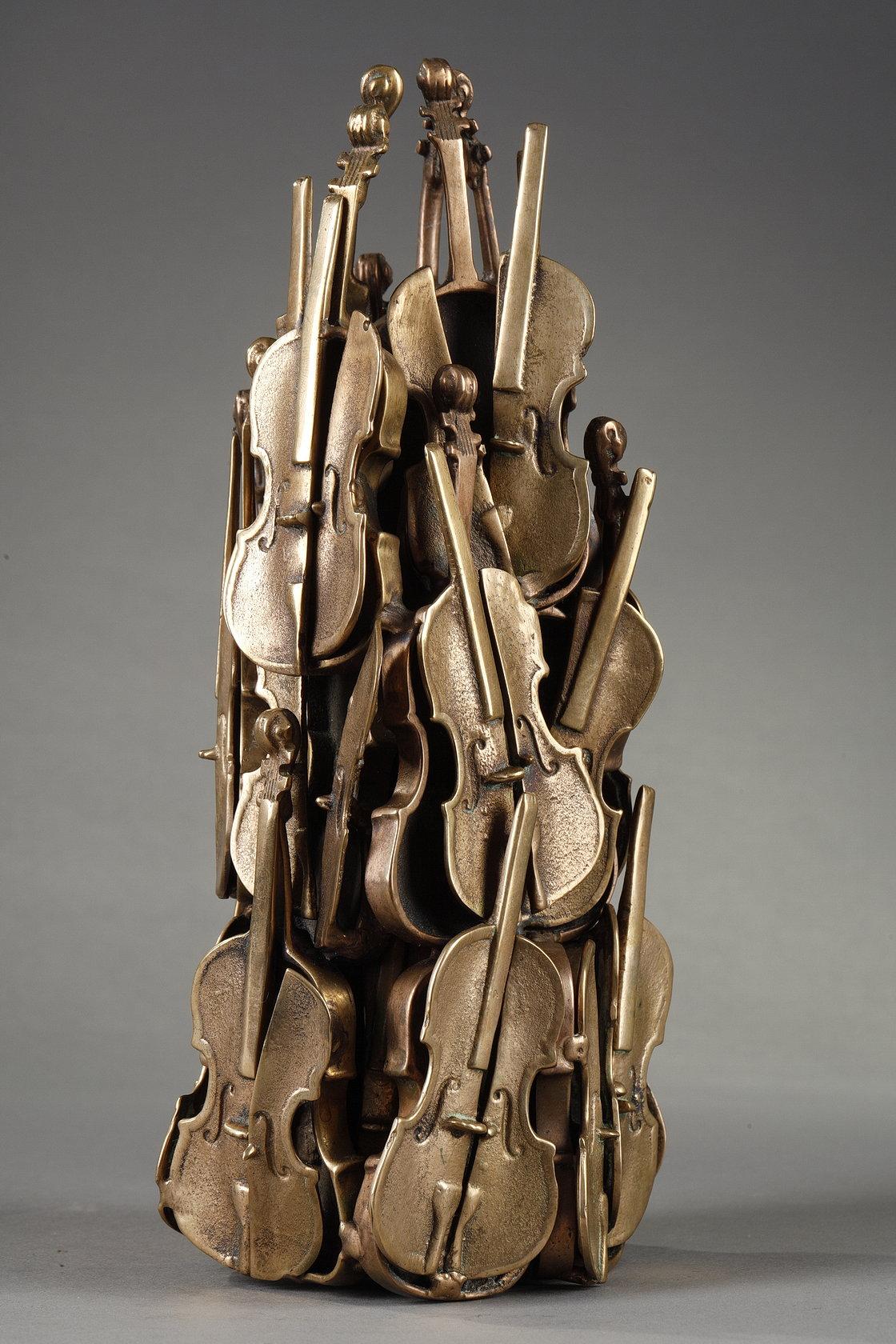 Grande Baroquial (Acropolis)
by Armand FERNANDEZ known as ARMAN (1928-2005)

Accumulation of cuts of miniature cellos, welded bronze, patinated gold,
signed 